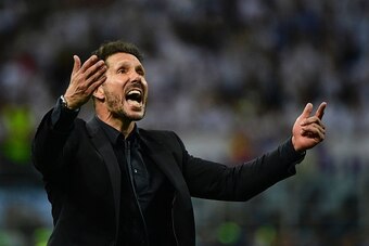 Atletico Madrid's Argentinian coach Diego Simeone celebrates after Real Madrid won the UEFA Champions League final football match between Real Madrid and Atletico Madrid at San Siro Stadium in Milan, on May 28, 2016. / AFP / PIERRE-PHILIPPE MARCOU        