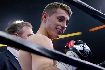 NEW YORK, NY - APRIL 11:  Ryan Burnett celebrates his win over Stephon McIntyre during the Premeier Boxing Champions Junior Featherweight bout at Barclays Center on April 11, 2015 in New York City.  (Photo by Elsa/Getty Images)