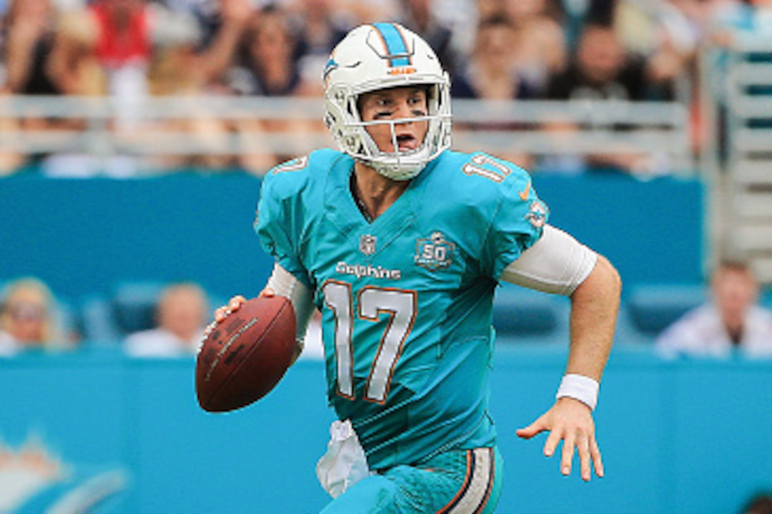MIAMI GARDENS, FL - JANUARY 03:  Ryan Tannehill #17 of the Miami Dolphins in action during the second half of the game against the New England Patriots at Sun Life Stadium on January 3, 2016 in Miami Gardens, Florida.  (Photo by Mike Ehrmann/Getty Images)