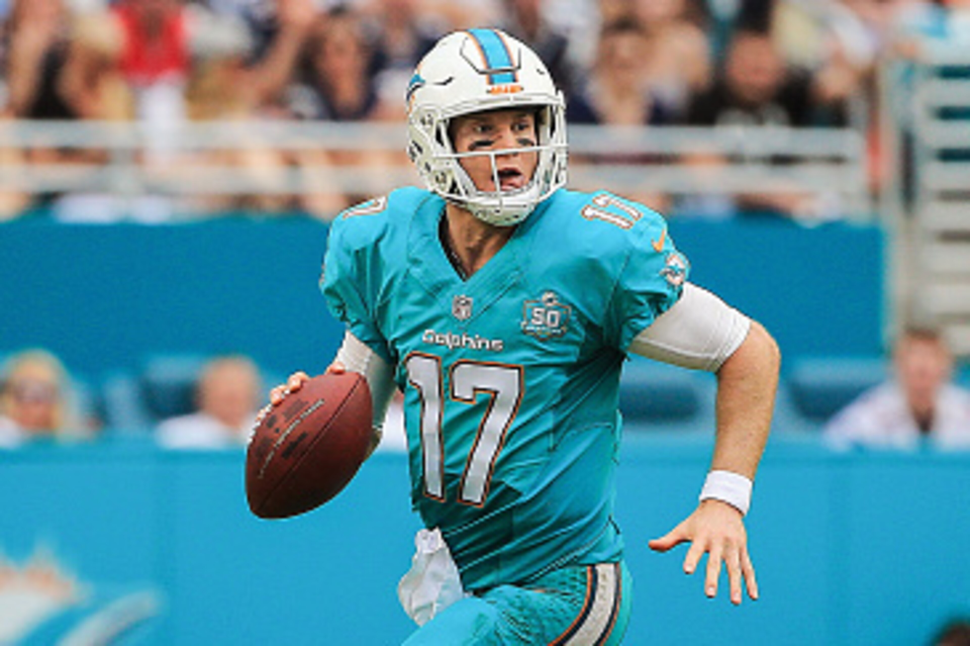 MIAMI GARDENS, FL - JANUARY 03:  Ryan Tannehill #17 of the Miami Dolphins in action during the second half of the game against the New England Patriots at Sun Life Stadium on January 3, 2016 in Miami Gardens, Florida.  (Photo by Mike Ehrmann/Getty Images)