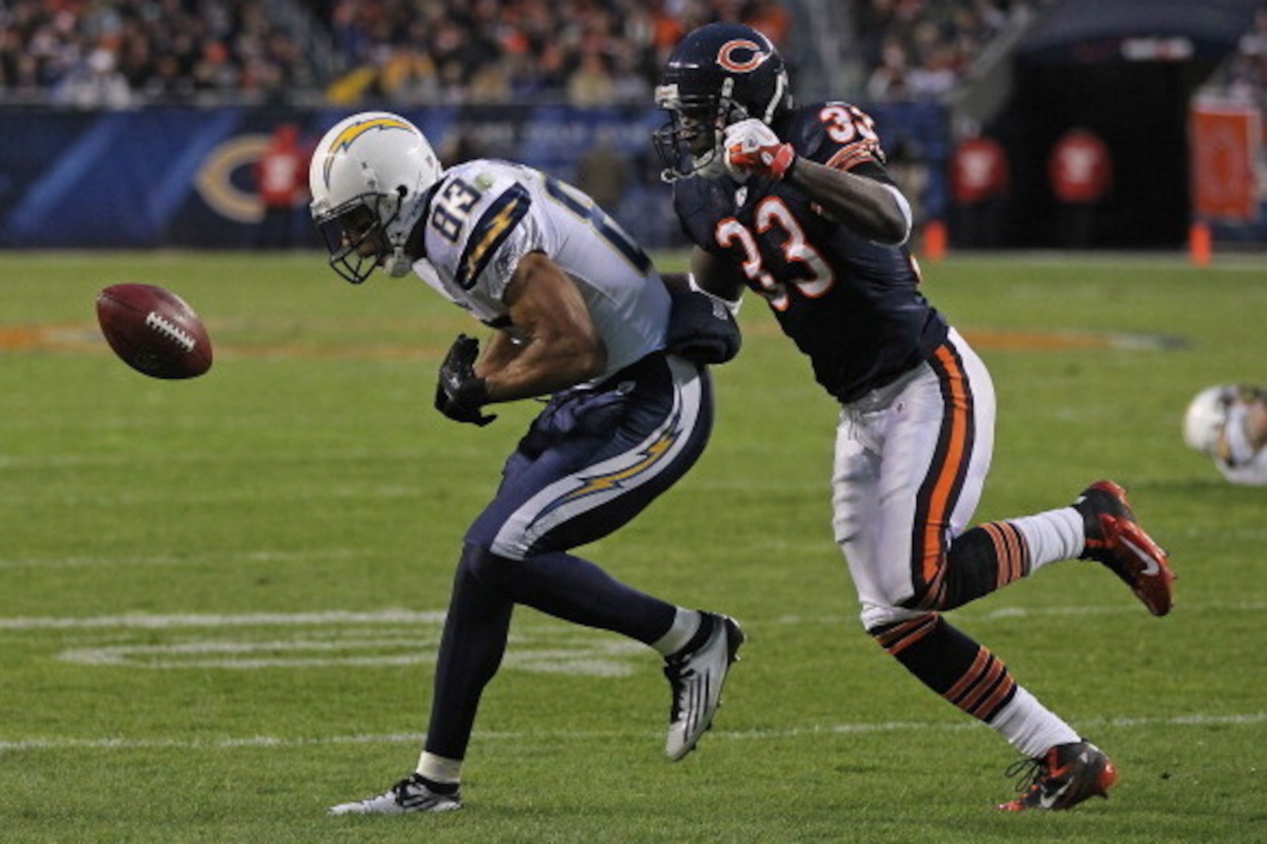 CHICAGO, IL - NOVEMBER 20: Vincent Jackson #83 of the San Diego Chargers drops a pass under pressure from Charles Tillman #33 of the Chicago Bears at Soldier Field on November 20, 2011 in Chicago, Illinois. The Bears defeated the Chargers 31-20.  (Photo b