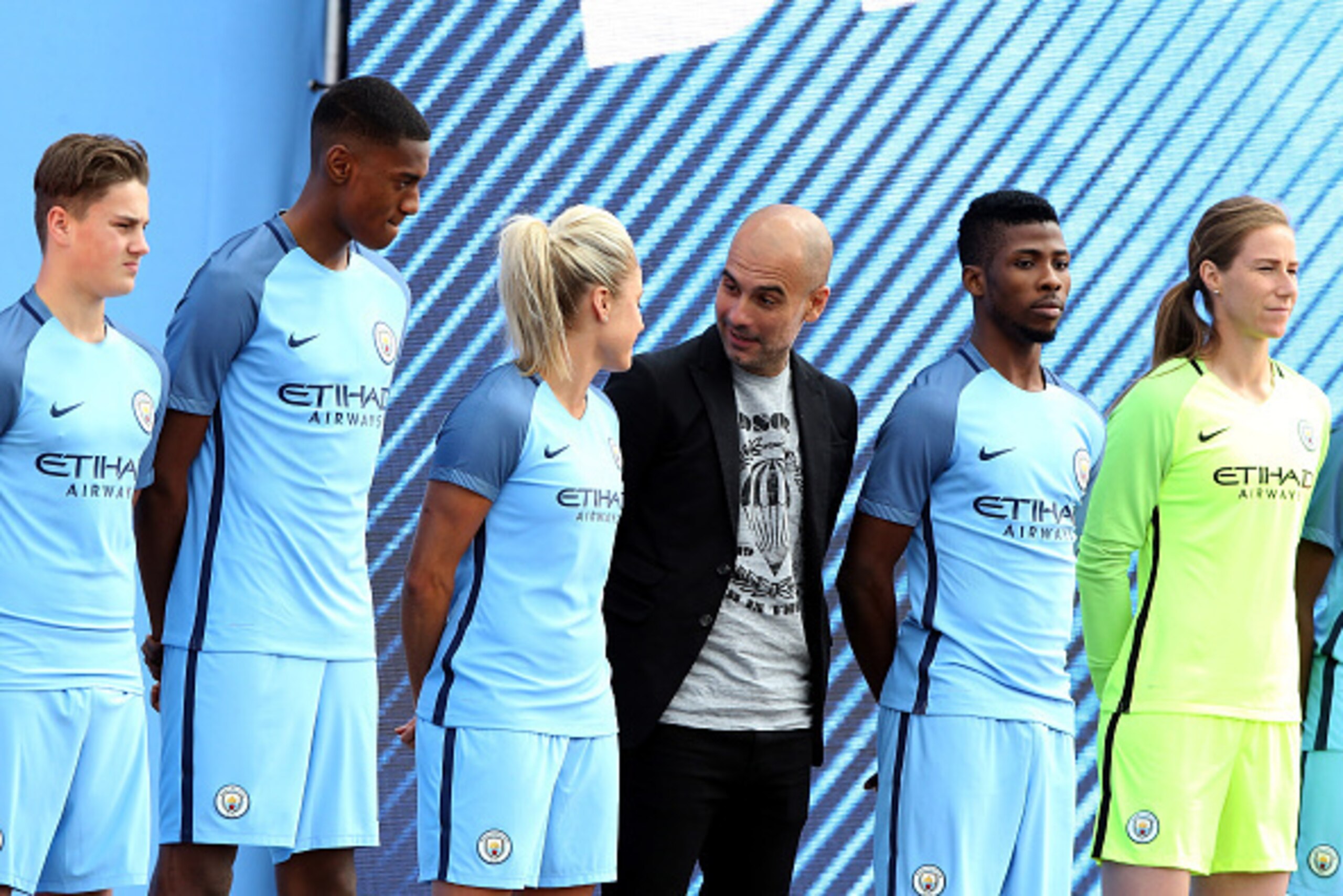 MANCHESTER, ENGLAND - JULY 03:  Manchester City's new Manager Pep Guardiola (3rdR) is unveiled with the clubs new kit during a media day at the Etihad campus on July 3, 2016 in Manchester, England.  (Photo by Nigel Roddis/Getty Images)