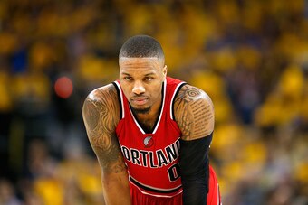 OAKLAND, CA - MAY 11:  Damian Lillard #0 of the Portland Trail Blazers stands on the court during their loss to the Golden State Warriors in Game Five of the Western Conference Semifinals during the 2016 NBA Playoffs on May 11, 2016 at Oracle Arena in Oak