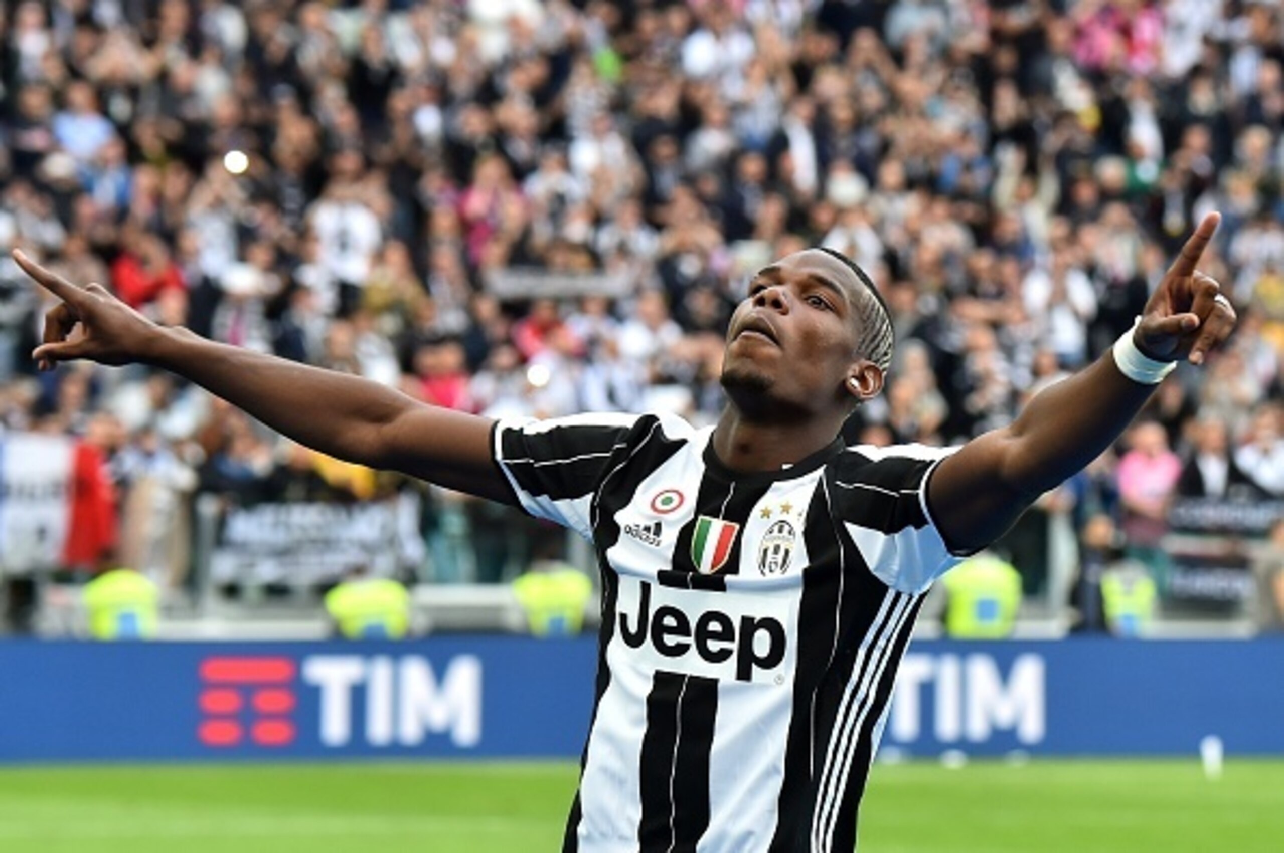Juventus' midfielder Paul Pogba from France celebrates after the Italian Serie A football match Juventus vs Sampdoria on May 14, 2016 at the 'Juventus Stadium' in Turin. Juventus celebrate a record-equalling fifth consecutive Serie A title. / AFP / GIUSEP Juventus' midfielder Paul Pogba from France celebrates after the Italian Serie A football match Juventus vs Sampdoria on May 14, 2016 at the 'Juventus Stadium' in Turin. Juventus celebrate a record-equalling fifth consecutive Serie A title. / AFP / GIUSEP