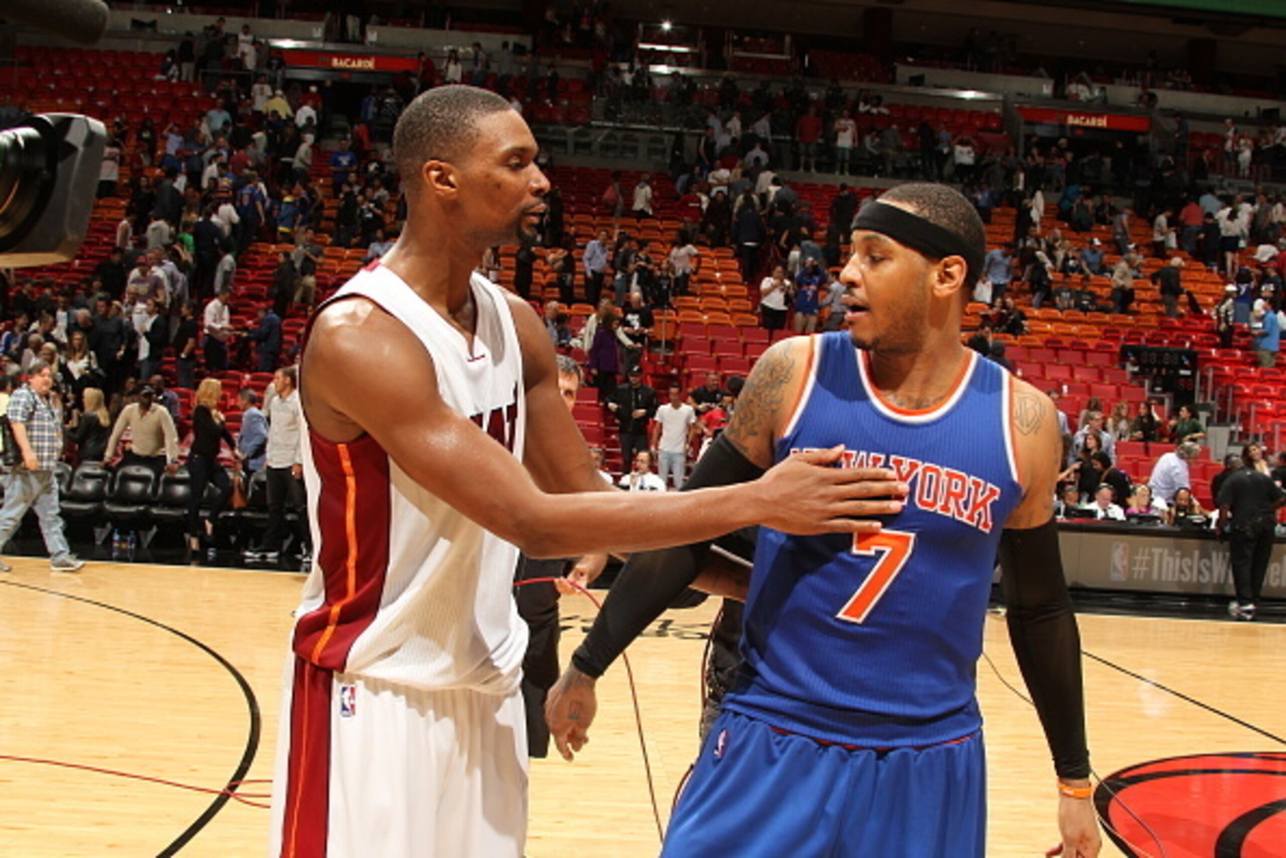 MIAMI, FL - JANUARY 6:  Carmelo Anthony #7 of the New York Knicks shakes hands with Chris Bosh #1 of the Miami Heat after the game on January 6, 2016 at American Airlines Arena in Miami, Florida. NOTE TO USER: User expressly acknowledges and agrees that, 