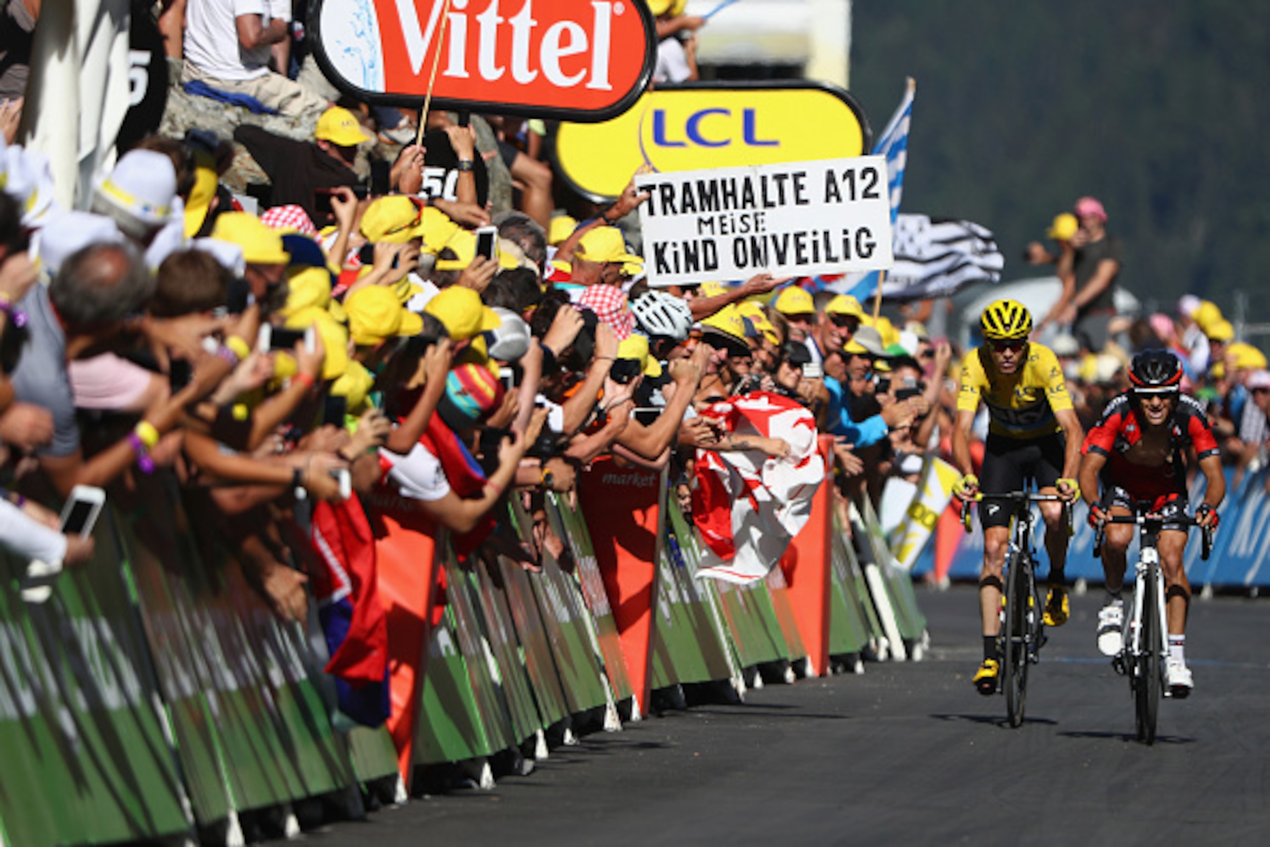 BERN, SWITZERLAND - JULY 20:  Richie Porte (R) of Australia and BMC Racing Team ahead of yellow jersey race leader Chris Froome of Great Britain and Team Sky at the finish line during the 184.5km stage seventeen of Le Tour de France from Berne to Finhaut-