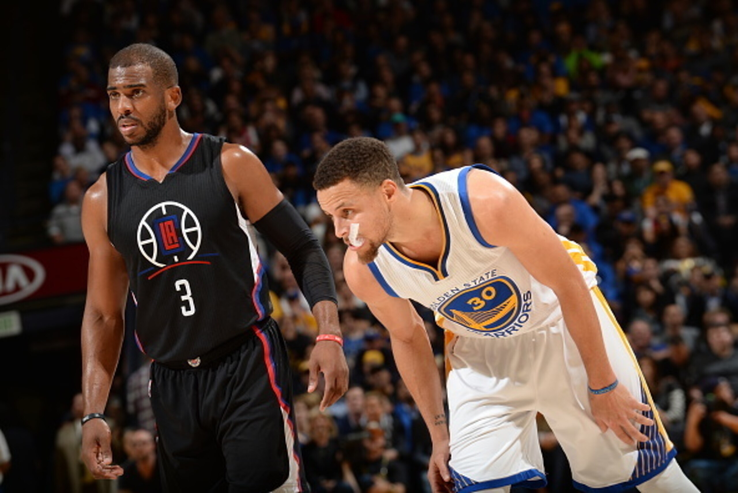 OAKLAND, CA - MARCH 23: Chris Paul #3 of the Los Angeles Clippers and Stephen Curry #30 of the Golden State Warriors during the game on March 23, 2016 at Oracle Arena in Oakland, California. NOTE TO USER: User expressly acknowledges and agrees that, by do
