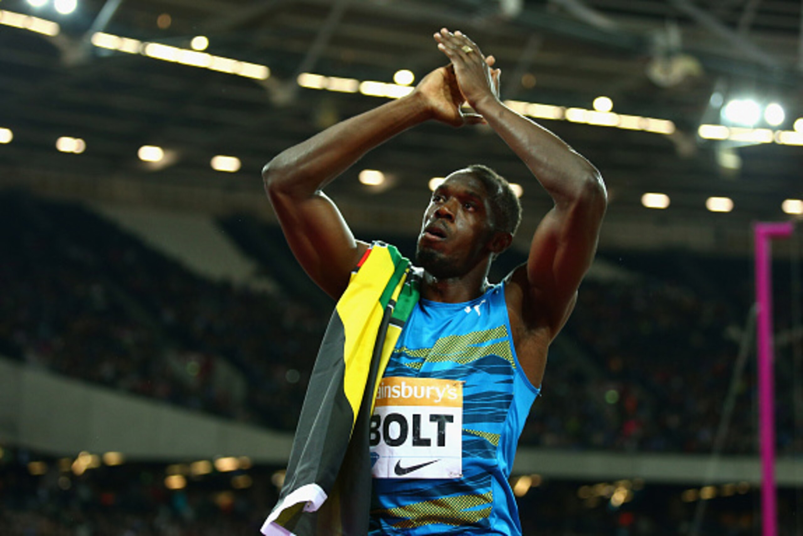 LONDON, ENGLAND - JULY 24:  Usain Bolt of Jamaica celebrates winning the Mens 100m final during day one of the Sainsbury's Anniversary Games at The Stadium - Queen Elizabeth Olympic Park on July 24, 2015 in London, England.  (Photo by Paul Gilham/Getty Im