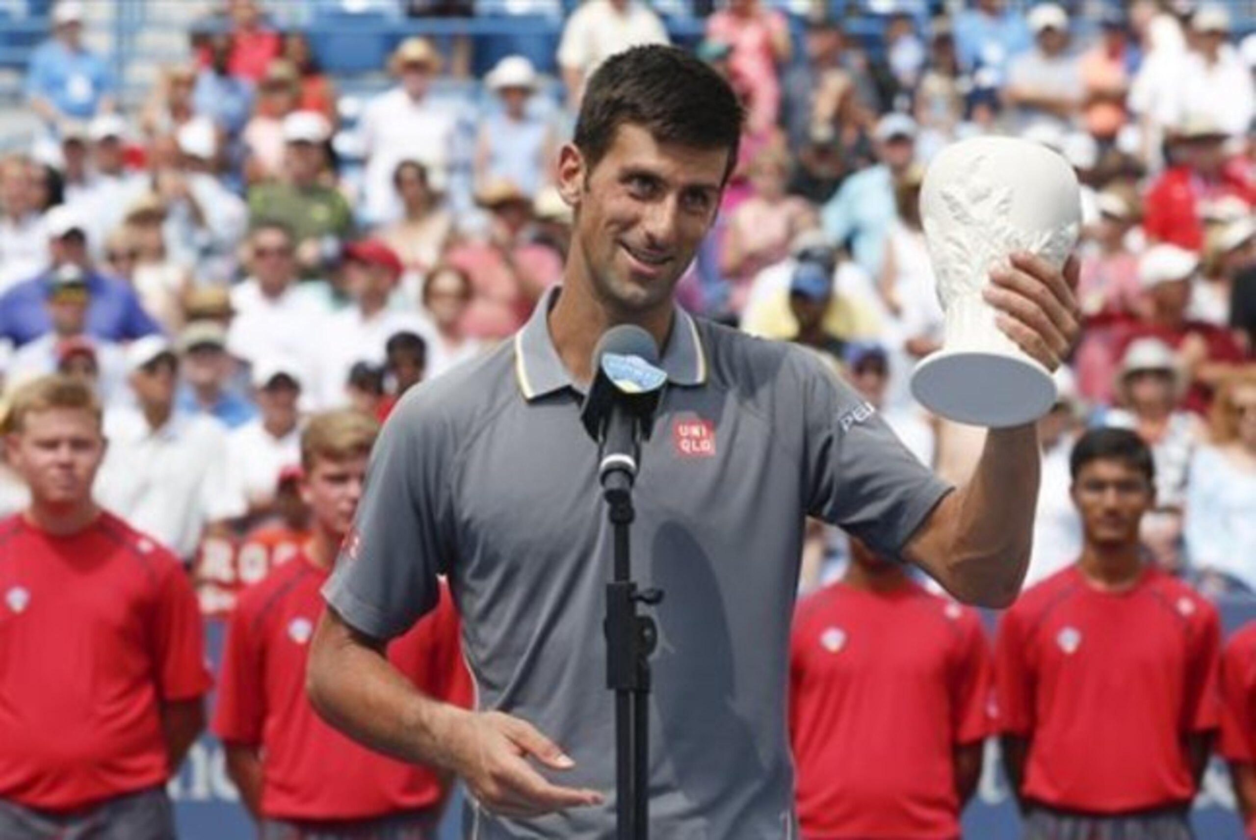 Djokovic accepts the runner-up trophy at the 2015 Western & Southern Open.