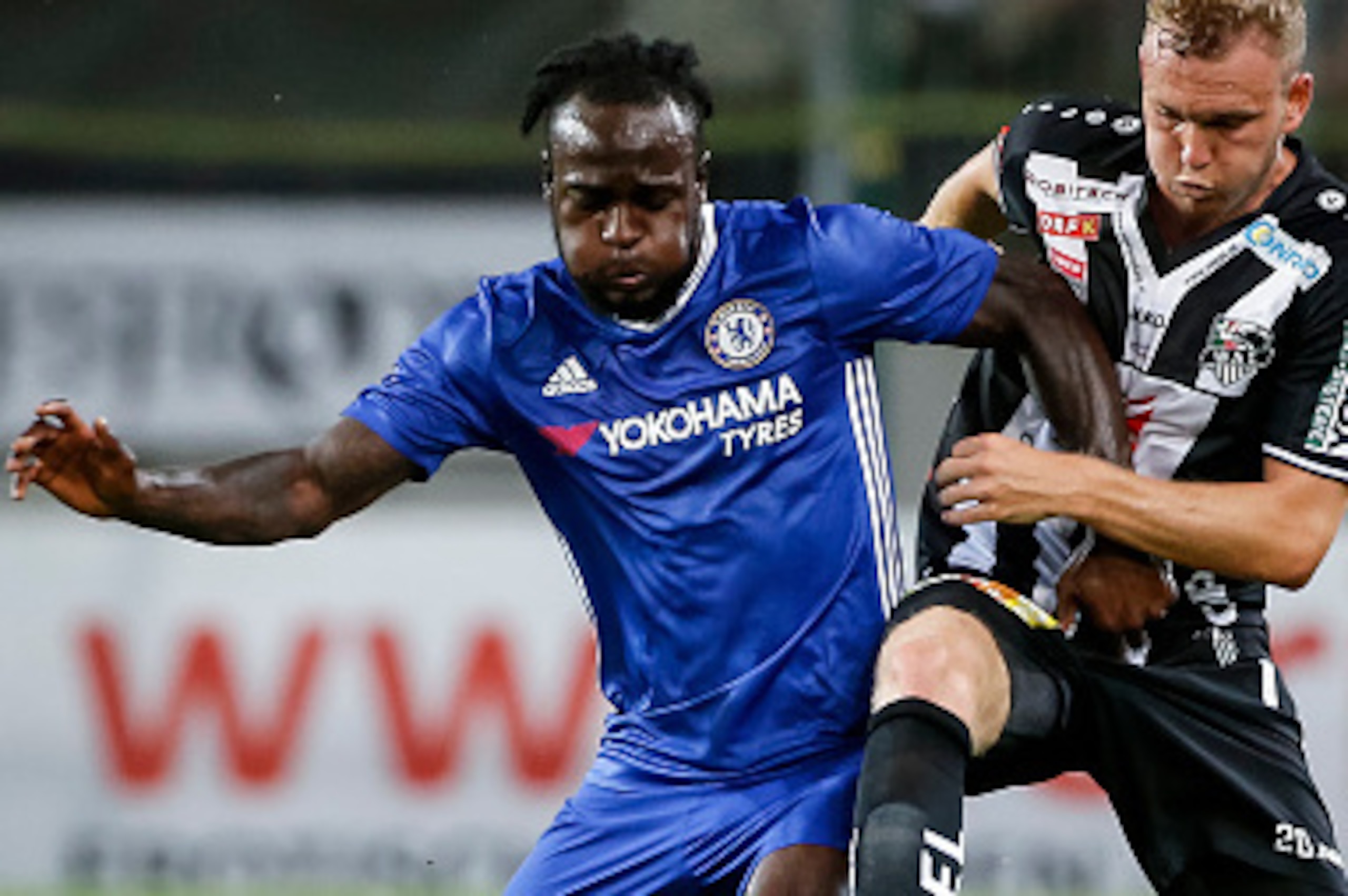 VELDEN, AUSTRIA - JULY 20: Victor Moses (L) of Chelsea in action against Christoph Rabitsch (R) of WAC RZ Pellets during the friendly match between WAC RZ Pellets and Chelsea F.C. at Worthersee Stadion on July 20, 2016 in Velden, Austria. (Photo by Srdjan