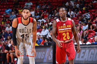 LAS VEGAS, NV - JULY 17:  Denzel Valentine #45 of the Chicago Bulls and Kay Felder #20 of the Cleveland Cavaliers stand on the court during the 2016 NBA Las Vegas Summer League game on July 17, 2016 at the Thomas & Mack Center in Las Vegas, Nevada. NOTE T