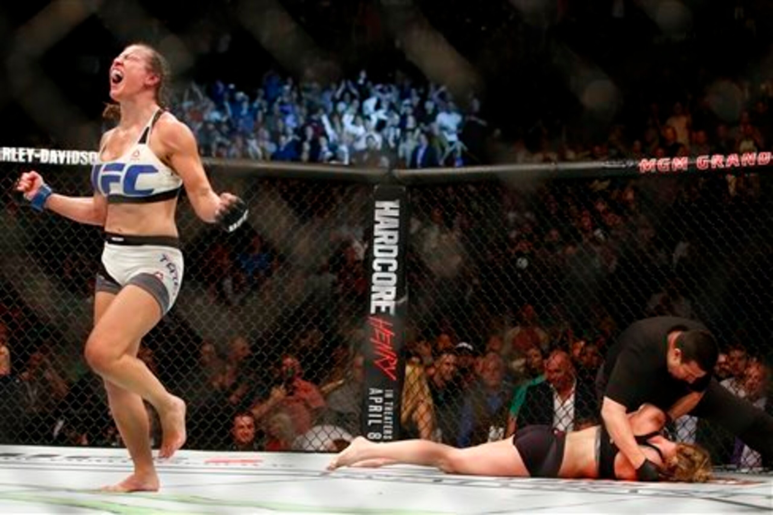 Tate celebrates her win over Holm.