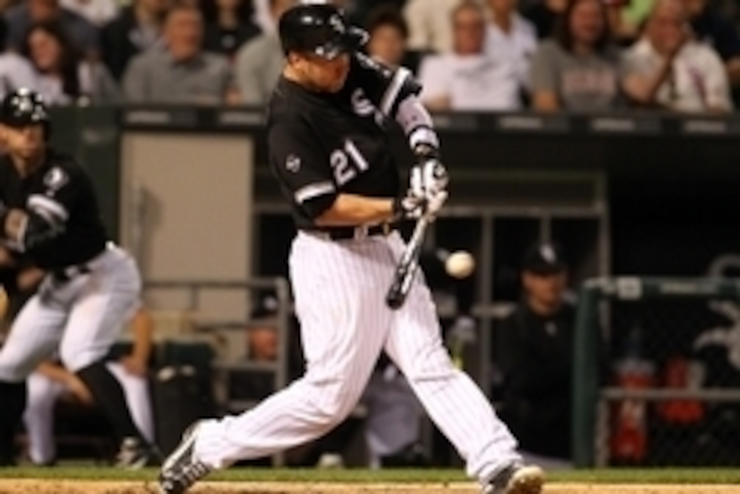 Jun 13, 2016; Chicago, IL, USA; Chicago White Sox third baseman Todd Frazier (21) hits in a run during the fifth inning against the Detroit Tigers at U.S. Cellular Field. Mandatory Credit: Caylor Arnold-USA TODAY Sports