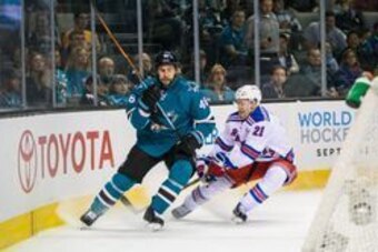 Mar 19, 2016; San Jose, CA, USA; New York Rangers center Derek Stepan (21) collides with San Jose Sharks defenseman Roman Polak (46) in the first period  at SAP Center at San Jose. Mandatory Credit: John Hefti-USA TODAY Sports.