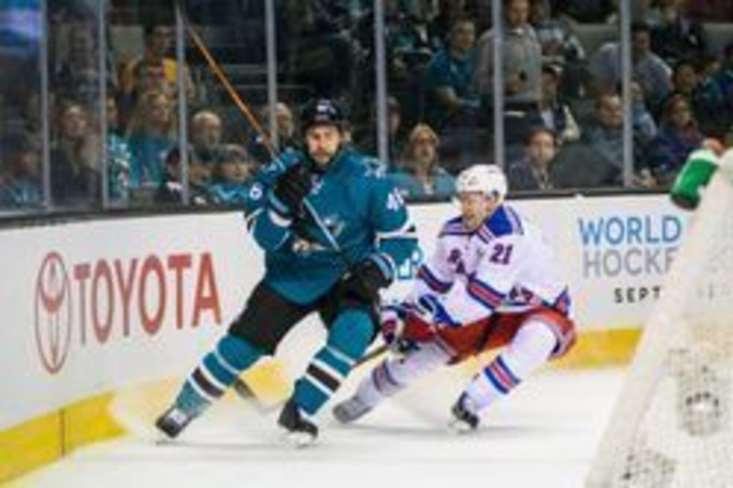 Mar 19, 2016; San Jose, CA, USA; New York Rangers center Derek Stepan (21) collides with San Jose Sharks defenseman Roman Polak (46) in the first period  at SAP Center at San Jose. Mandatory Credit: John Hefti-USA TODAY Sports.