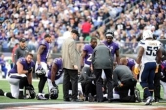Nov 1, 2015; Baltimore, MD, USA; Baltimore Ravens players react as wide receiver Steve Smith, Sr. (89) lays on the ground in the third quarter against the San Diego Chargers at M&T Bank Stadium. Mandatory Credit: Evan Habeeb-USA TODAY Sports