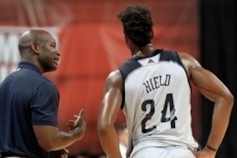 Jul 8, 2016; Las Vegas, NV, USA; New Orleans Pelicans head coach Robert Pack talks with guard Buddy Hield (24) during an NBA Summer League game against the Los Angeles Lakers at Thomas &  Mack Center. Los Angeles won the game 85-65. Mandatory Credit: Step
