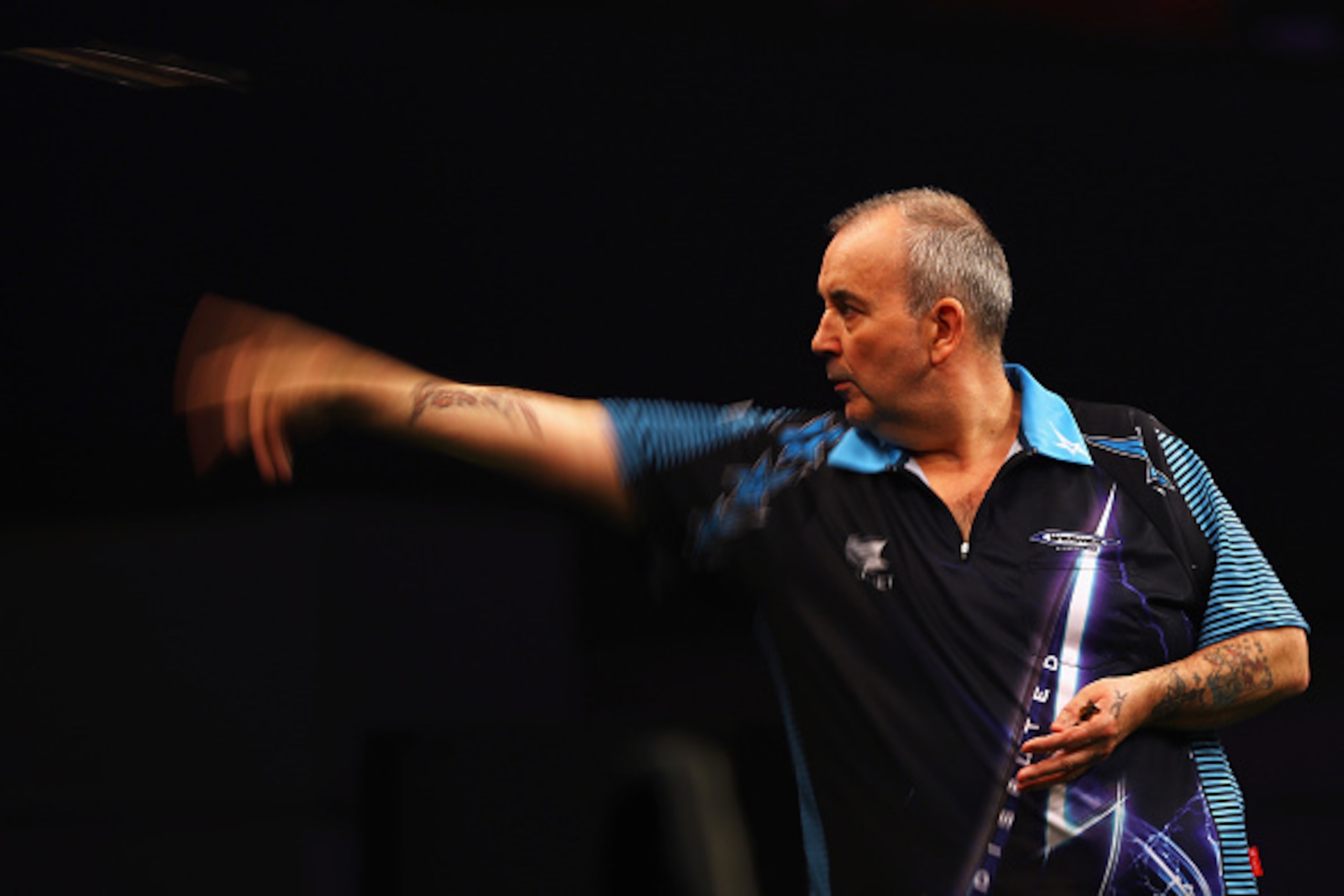 ROTTERDAM, NETHERLANDS - MAY 12:  Phil 'The Power' Taylor of England plays a shot in his match against Michael van Gerwen of the Netherlands during the Darts Betway Premier League Night 15 at Rotterdam Ahoy on May 12, 2016 in Rotterdam, .  (Photo by Dean 