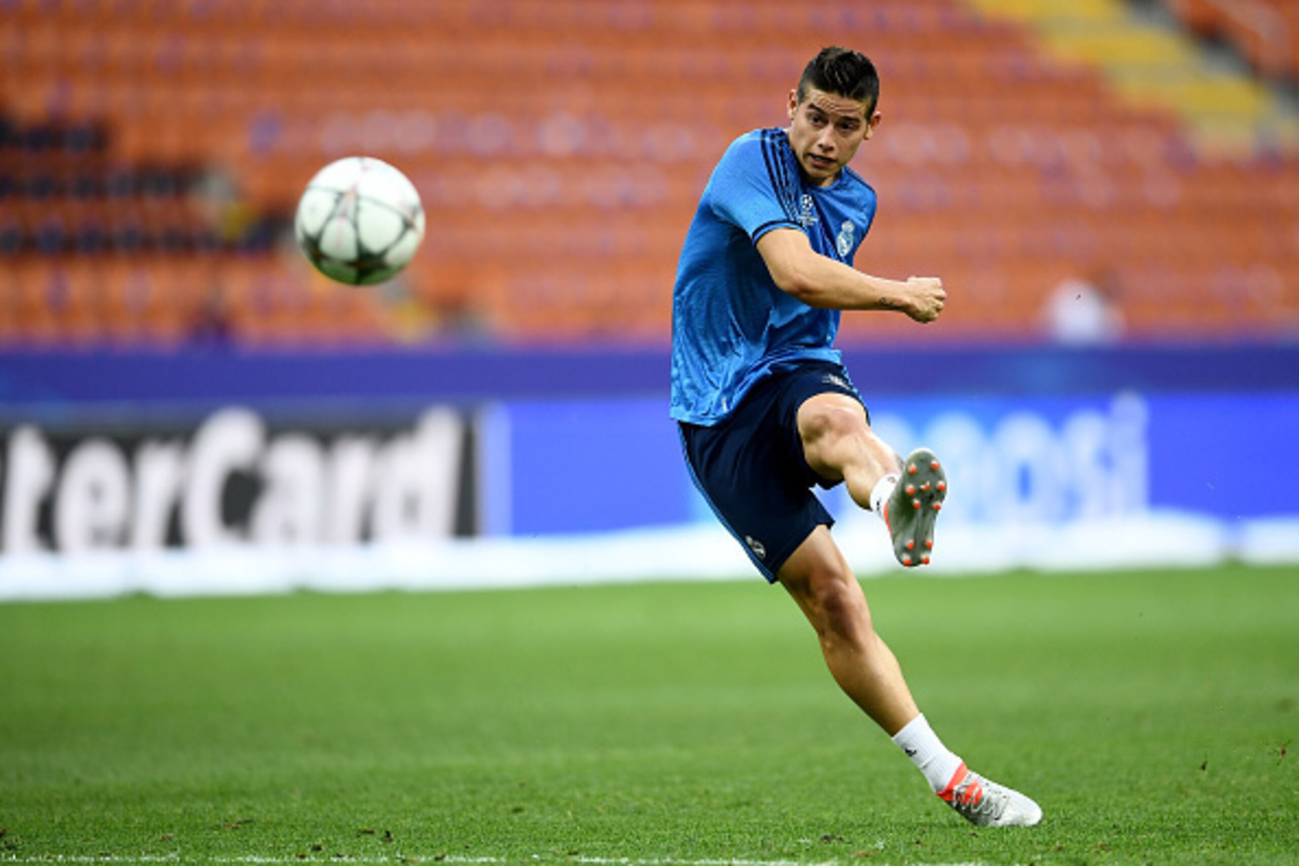 MILAN, ITALY - MAY 27:  James Rodriguez of Real Madrid has a shot on goal during a Real Madrid training session on the eve of the UEFA Champions League Final against Atletico de Madrid at Stadio Giuseppe Meazza on May 27, 2016 in Milan, Italy.  (Photo by 