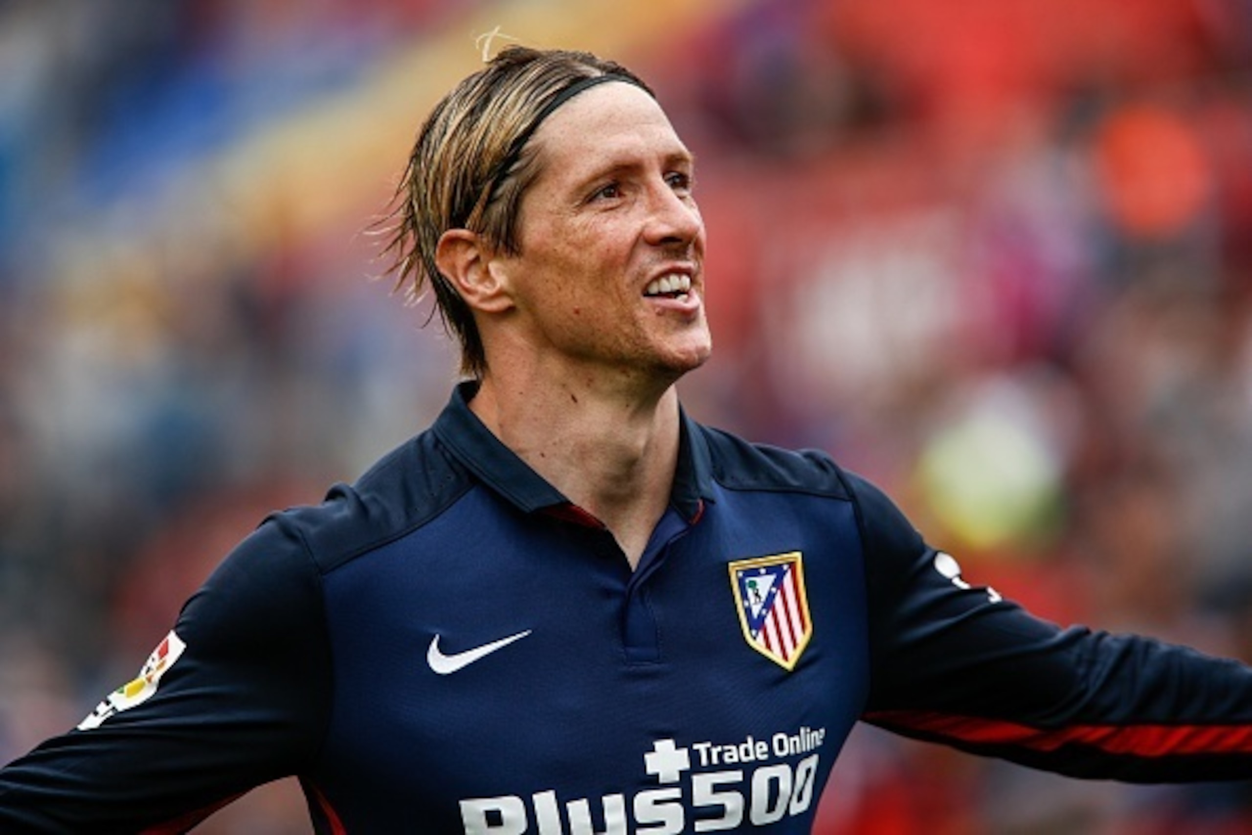 Atletico's forward Fernando Torres celebrates a goal during the Spanish league football match Levante UD vs Club Atletico de Madrid at the Ciutat de Valencia stadium in Valencia on May 8, 2016. / AFP / BIEL ALINO        (Photo credit should read BIEL ALIN