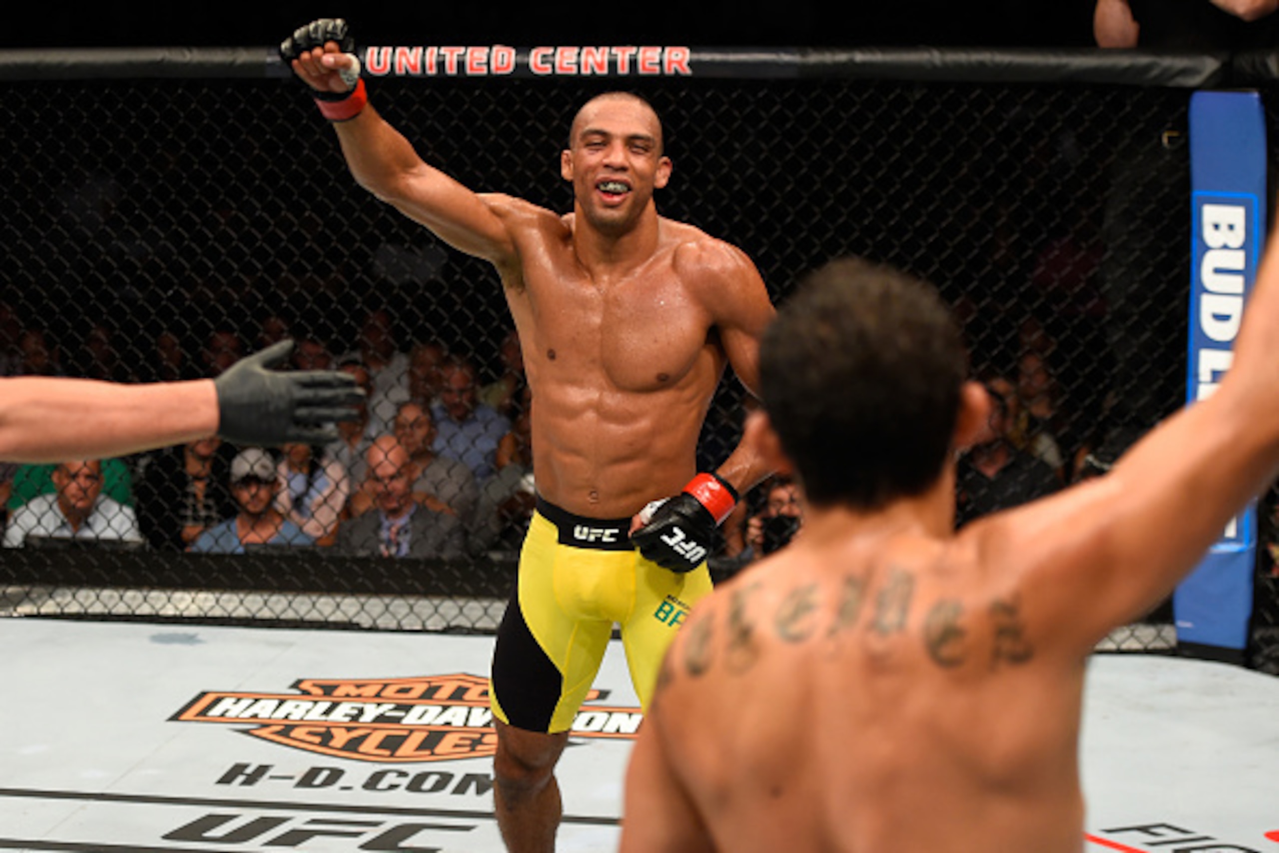 CHICAGO, IL - JULY 23:  (L-R) Edson Barboza of Brazil and Gilbert Melendez celebrate after finishing three rounds in their lightweight bout during the UFC Fight Night event at the United Center on July 23, 2016 in Chicago, Illinois. (Photo by Josh Hedges/