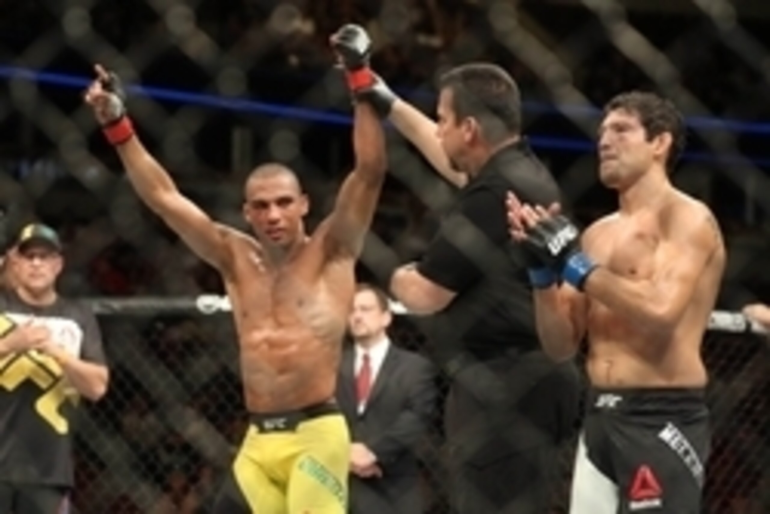 July 23, 2016; Chicago, IL, USA; Edson Barboza (red gloves) reacts after defeating Gilbert Melendez (blue gloves) during UFC Fight Night at United Center. Mandatory Credit: Kamil Krzaczynski-USA TODAY Sports