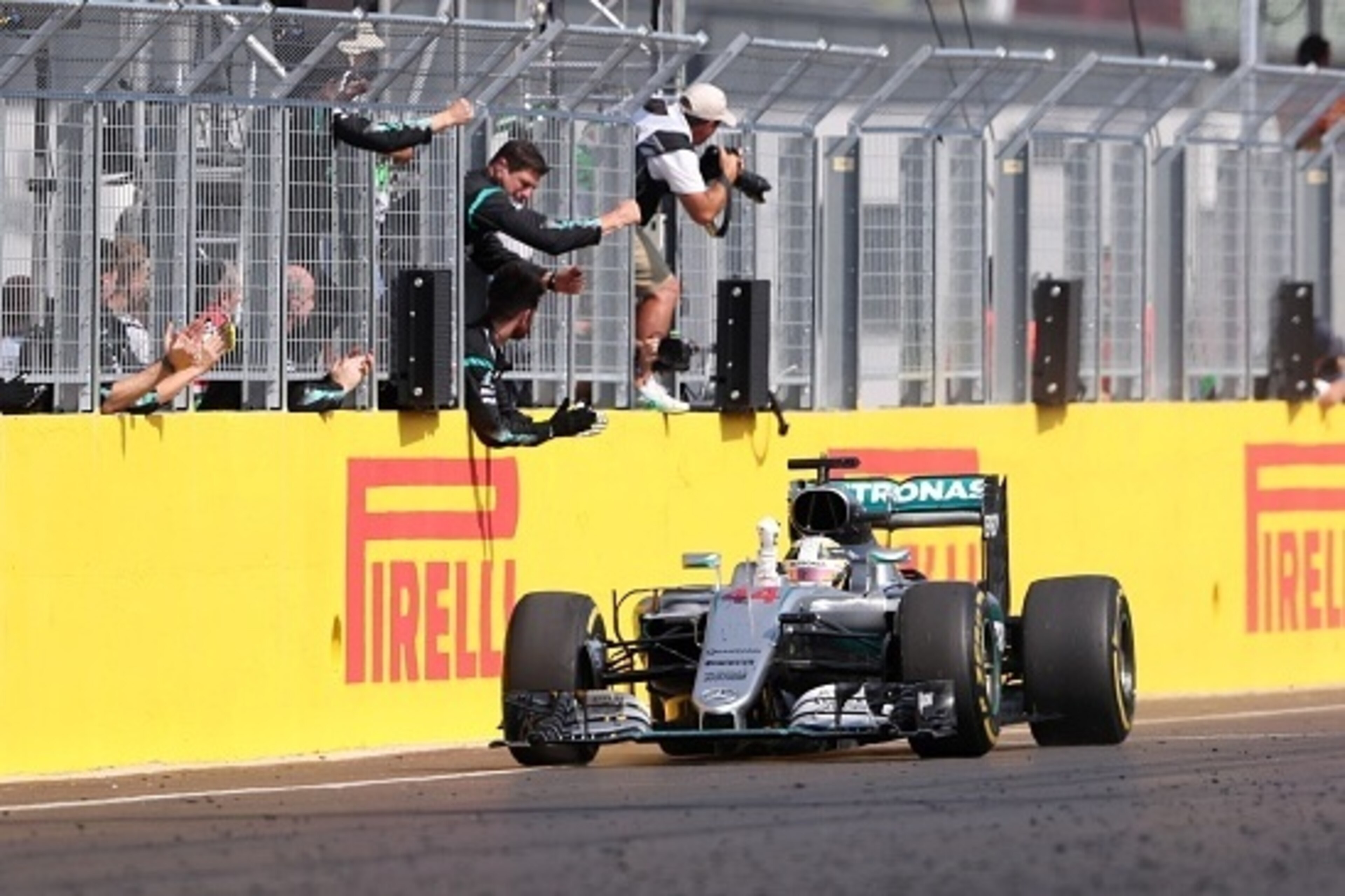 Mercedes AMG Petronas F1 Team's British driver Lewis Hamilton celebrates winning the Hungarian Formula One Grand Prix on July 24, 2016 at the Hungaroring circuit near Budapest. / AFP / FERENC ISZA (Photo credit should read FERENC ISZA/AFP/Getty Mercedes AMG Petronas F1 Team's British driver Lewis Hamilton celebrates winning the Hungarian Formula One Grand Prix on July 24, 2016 at the Hungaroring circuit near Budapest. / AFP / FERENC ISZA (Photo credit should read FERENC ISZA/AFP/Getty