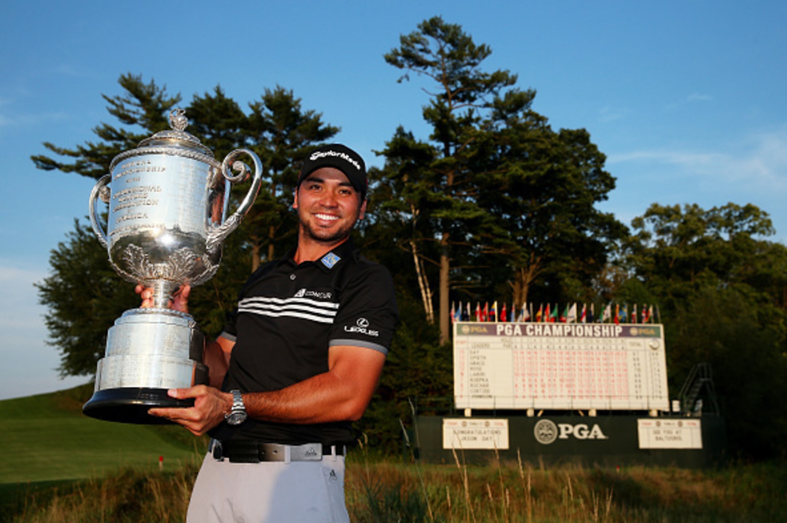 SHEBOYGAN, WI - AUGUST 16:  Jason Day of Australia poses with the Wanamaker Trophy after winning the 2015 PGA Championship with a score of 20-under par at Whistling Straits on August 16, 2015 in Sheboygan, Wisconsin.  (Photo by Andrew Redington/Getty Imag