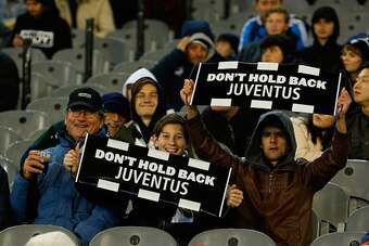 MELBOURNE, AUSTRALIA - JULY 23:  Juventus fans watch on during the 2016 International Champions Cup Australia match between Melbourne Victory FC and Juventus FC at Melbourne Cricket Ground on July 23, 2016 in Melbourne, Australia.  (Photo by Daniel Pocket