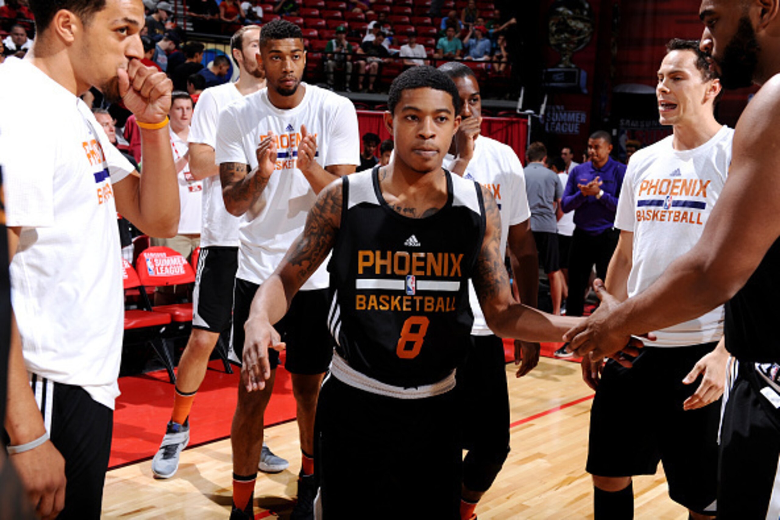 LAS VEGAS, NV - JULY 10: Tyler Ulis #8 of Phoenix Suns gets introduced before the game against the Boston Celtics during the 2016 NBA Las Vegas Summer League on July 10, 2016 at the Thomas & Mack Center in Las Vegas, Nevada. NOTE TO USER: User expressly a LAS VEGAS, NV - JULY 10: Tyler Ulis #8 of Phoenix Suns gets introduced before the game against the Boston Celtics during the 2016 NBA Las Vegas Summer League on July 10, 2016 at the Thomas & Mack Center in Las Vegas, Nevada. NOTE TO USER: User expressly a