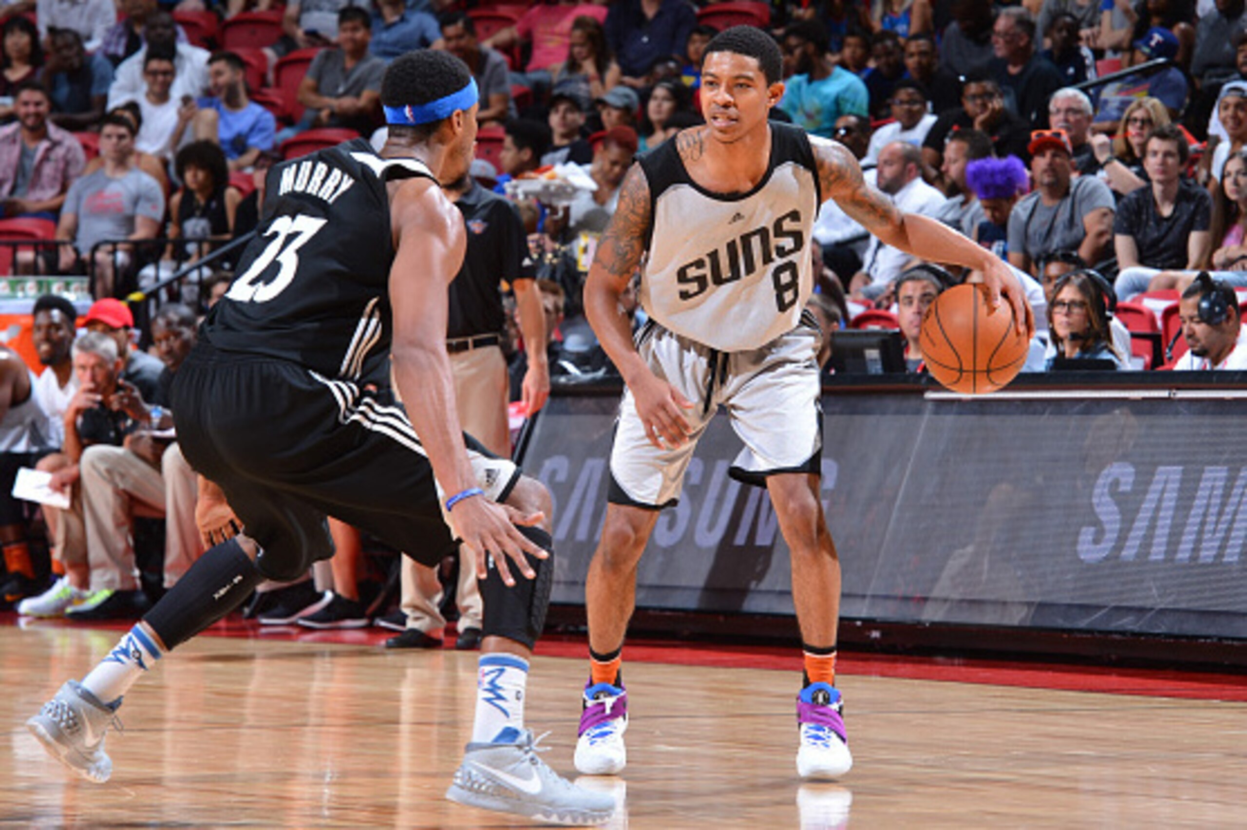 LAS VEGAS, NV - JULY 17: Tyler Ulis #8 of the Phoenix Suns handles the ball against the Minnesota Timberwolves during the 2016 NBA Las Vegas Summer League game on July 17, 2016 at the Thomas & Mack Center in Las Vegas, Nevada. NOTE TO USER: User expressl LAS VEGAS, NV - JULY 17: Tyler Ulis #8 of the Phoenix Suns handles the ball against the Minnesota Timberwolves during the 2016 NBA Las Vegas Summer League game on July 17, 2016 at the Thomas & Mack Center in Las Vegas, Nevada. NOTE TO USER: User expressl