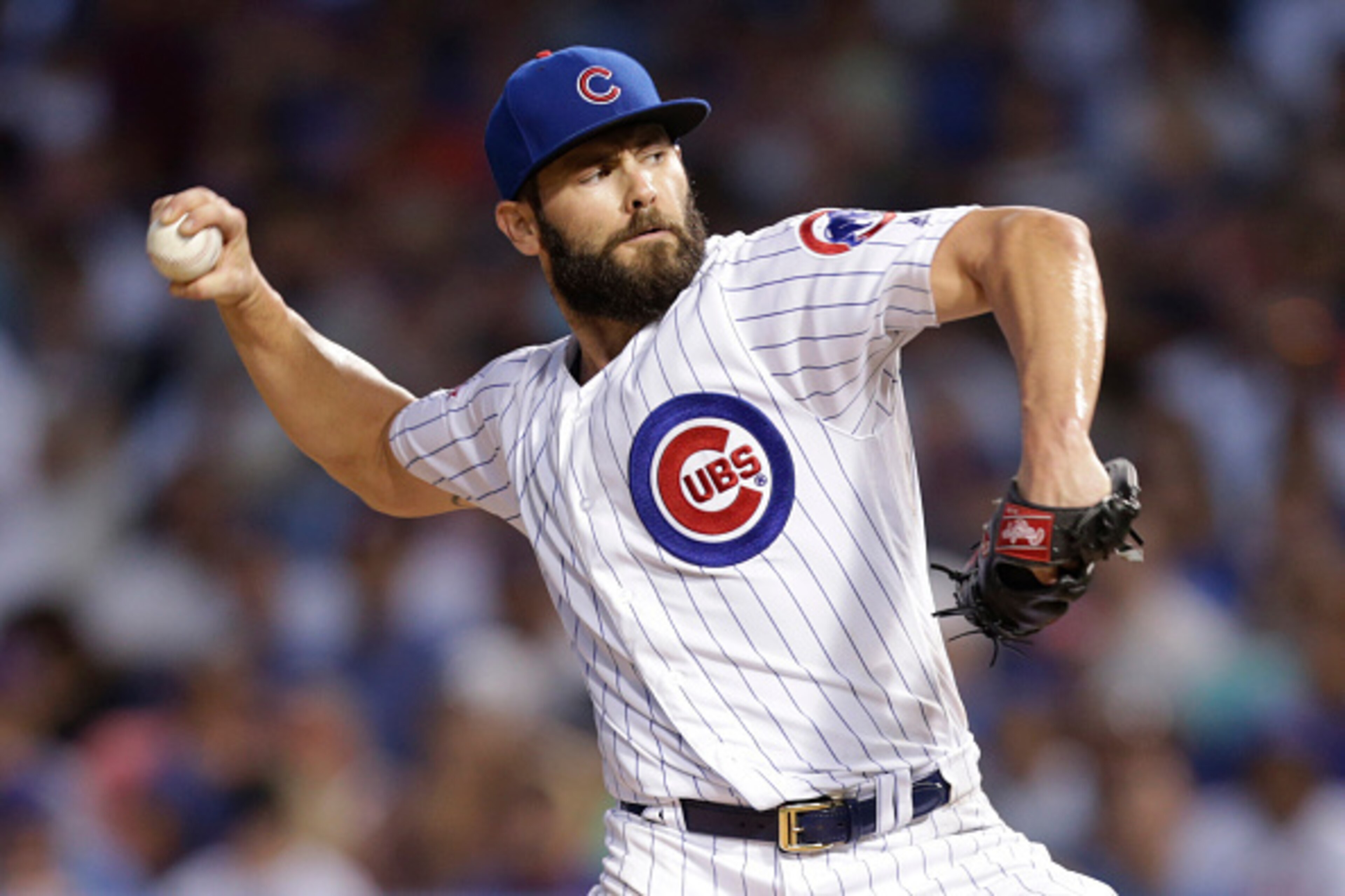 CHICAGO, IL - JULY 19: Jake Arrieta #49 of the Chicago Cubs pitches during the seventh inning against the New York Mets at Wrigley Field on July 19, 2016 in Chicago, Illinois. (Photo by Mike McGinnis/Getty Images)