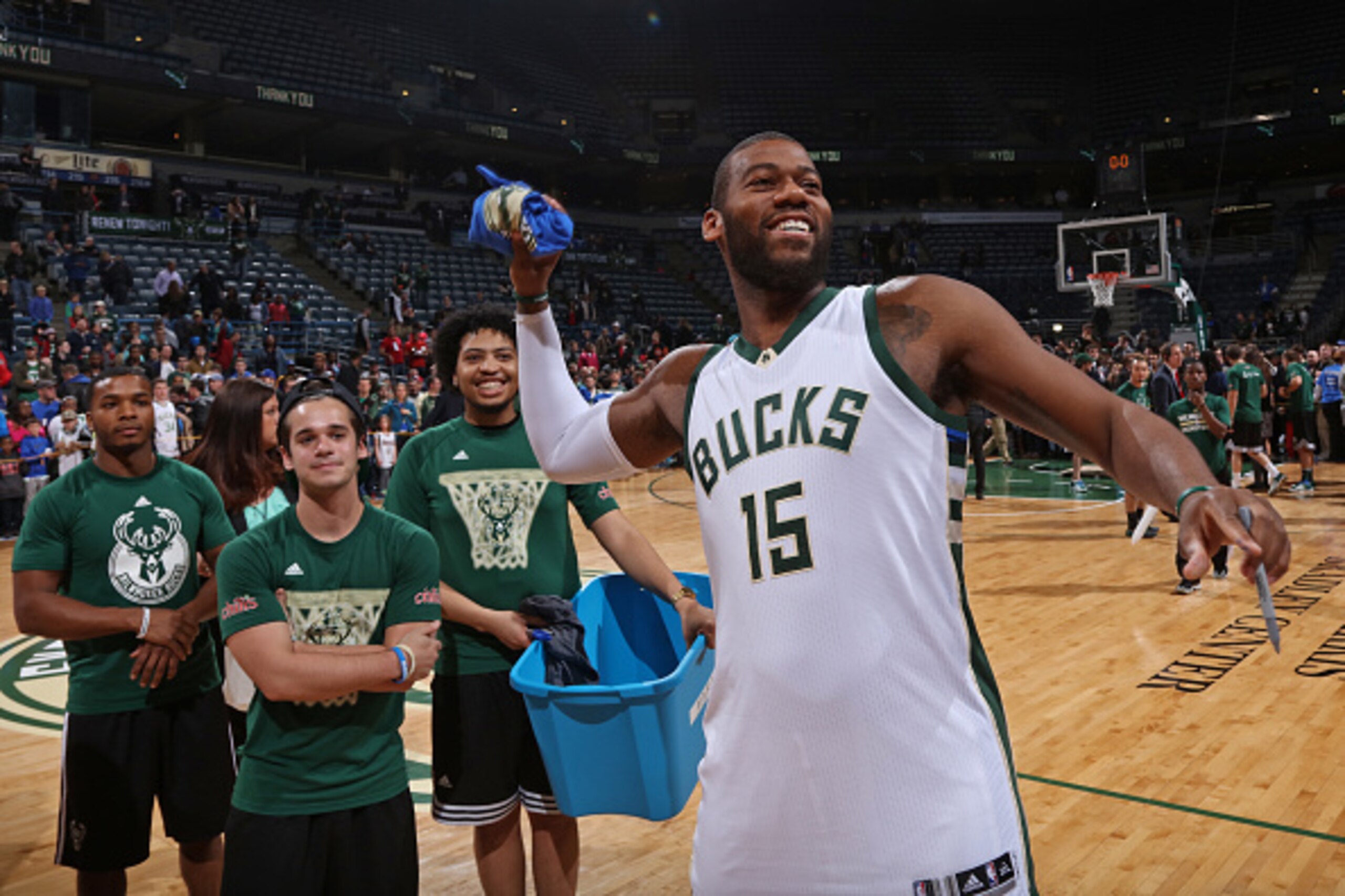MILWAUKEE, WI - APRIL 13: Greg Monroe #15 of the Milwaukee Bucks throws merchandise to fans after the game against the Indiana Pacers on April 13, 2016 at the BMO Harris Bradley Center in Milwaukee, Wisconsin. NOTE TO USER: User expressly acknowledges an MILWAUKEE, WI - APRIL 13: Greg Monroe #15 of the Milwaukee Bucks throws merchandise to fans after the game against the Indiana Pacers on April 13, 2016 at the BMO Harris Bradley Center in Milwaukee, Wisconsin. NOTE TO USER: User expressly acknowledges an