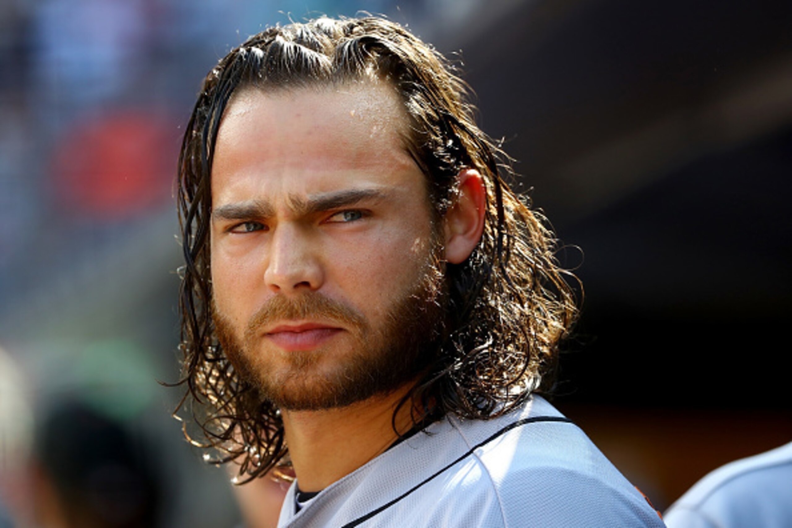NEW YORK, NY - JULY 23:  Brandon Crawford #35 of the San Francisco Giants looks on from the dugout before the game against the New York Yankees on July 23, 2016 at Yankee Stadium in the Bronx borough of New York City.  (Photo by Elsa/Getty Images)