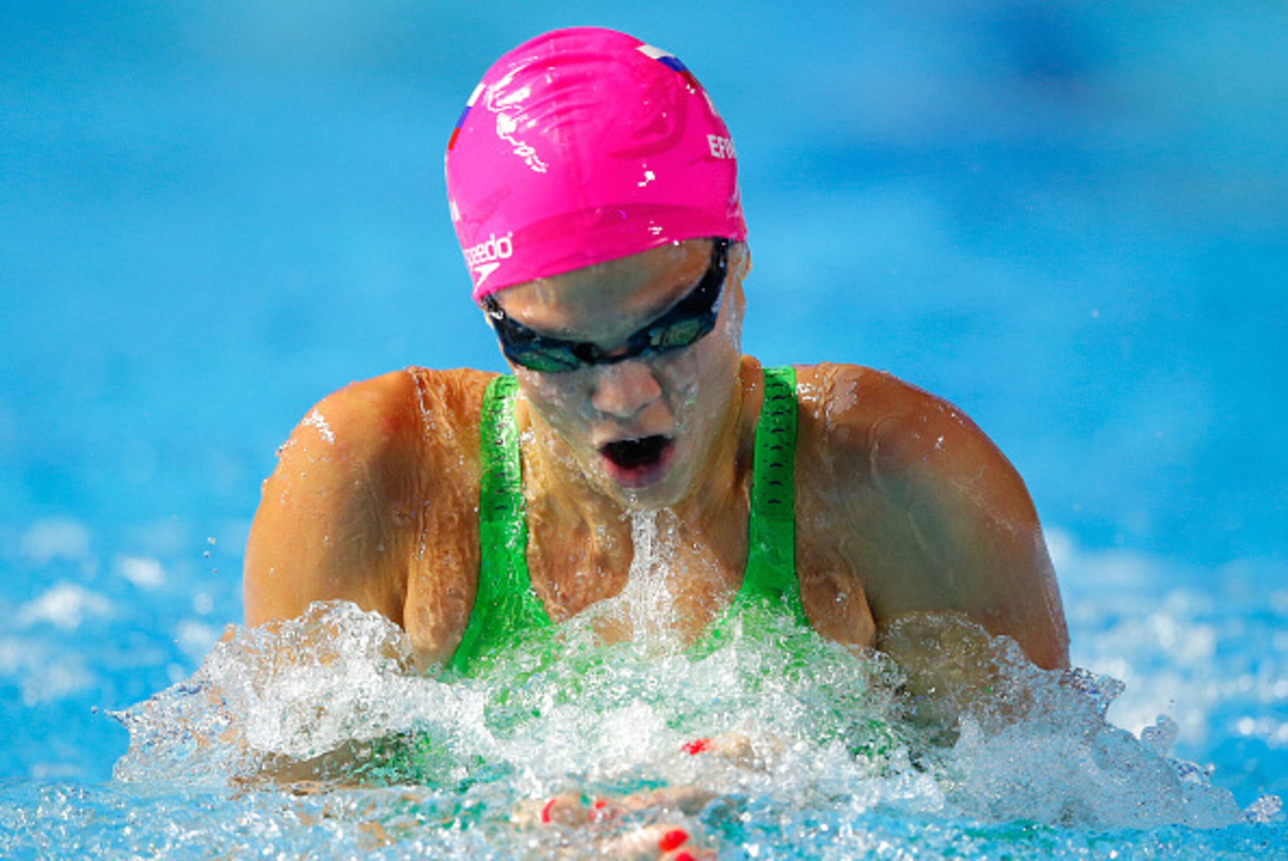 INDIANAPOLIS, IN - DECEMBER 12:  Yuliya Efimova of Russia competes in the Women's 100m Breaststroke during day two of the Mutual of Omaha Duel in the Pool at Indiana University Natatorium on December 12, 2015 in Indianapolis, Indiana.  (Photo by Kevin C. 