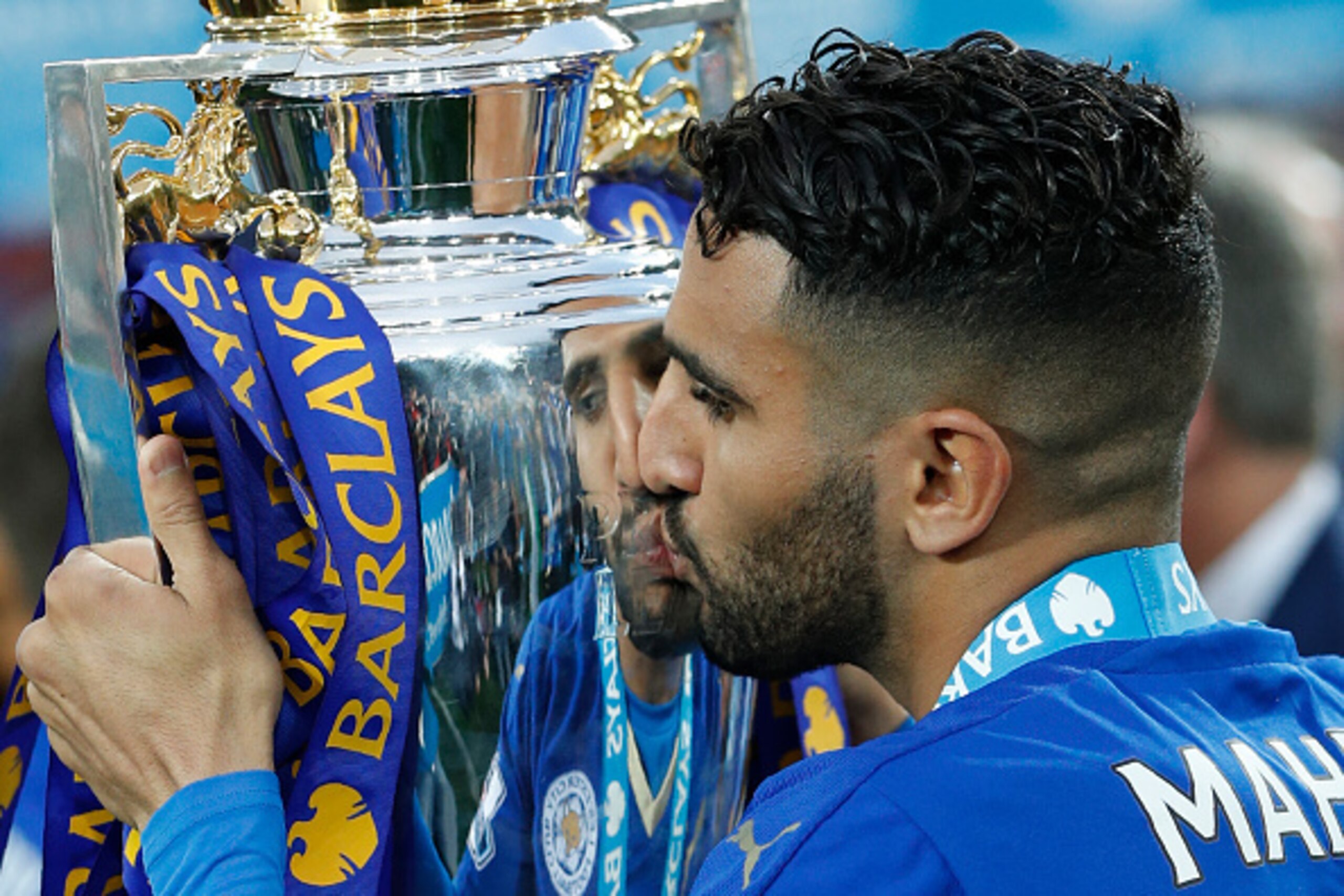Leicester City's Algerian midfielder Riyad Mahrez kisses the premier league trophy after winning the league and the English Premier League football match between Leicester City and Everton at King Power Stadium in Leicester, central England on May 7, 2016 Leicester City's Algerian midfielder Riyad Mahrez kisses the premier league trophy after winning the league and the English Premier League football match between Leicester City and Everton at King Power Stadium in Leicester, central England on May 7, 2016