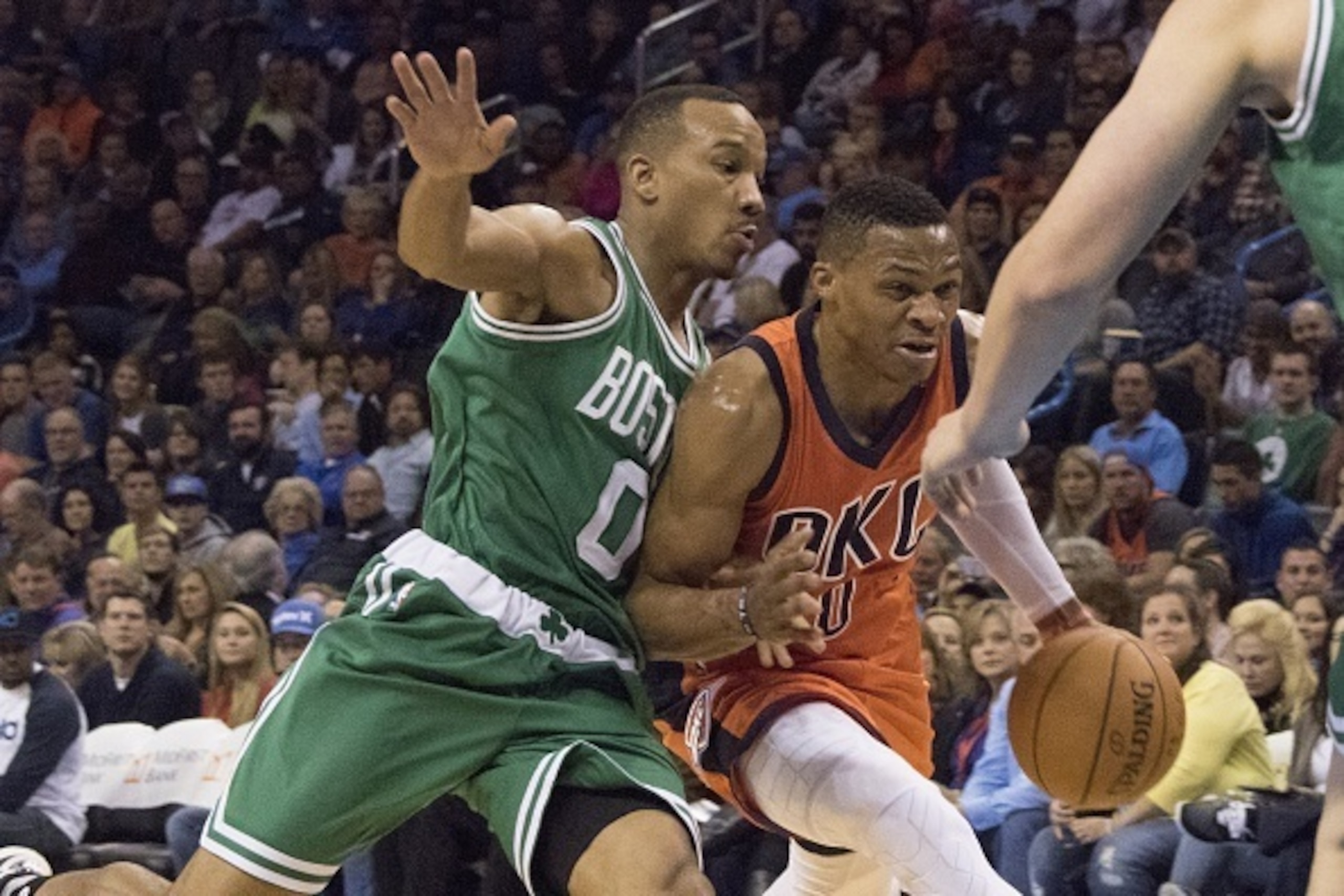 OKLAHOMA CITY, OK - NOVEMBER 15: Avery Bradley #0 of the Boston Celtics tries to stop Russell Westbrook #0 of the Oklahoma City Thunder during the first quarter of a NBA game at the Chesapeake Energy Arena on November 15, 2015 in Oklahoma City, Oklahoma. 