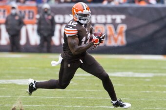CLEVELAND, OH - NOVEMBER 24: Wide receiver Josh Gordon #12 of the Cleveland Browns runs for a gain during the second half against the Pittsburgh Steelers at FirstEnergy Stadium on November 24, 2013 in Cleveland, Ohio. The Steelers defeated the Browns 27-1