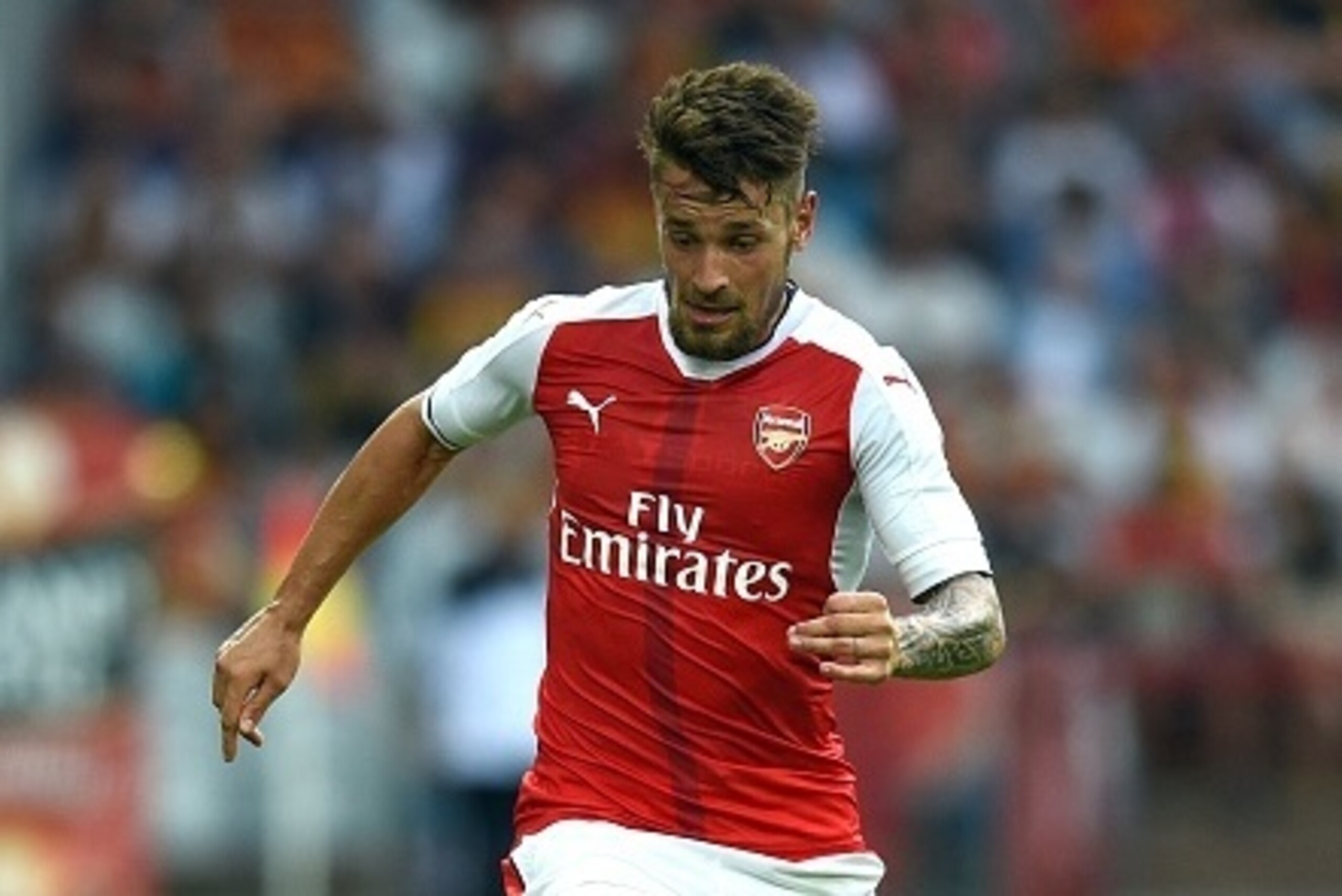Arsenal's french defender Mathieu Debuchy controls the ball during the football match Lens versus Arsenal on July 22 2016, at the Felix Bollaert stadium in Lens. / AFP / DENIS CHARLET        (Photo credit should read DENIS CHARLET/AFP/Getty Images)