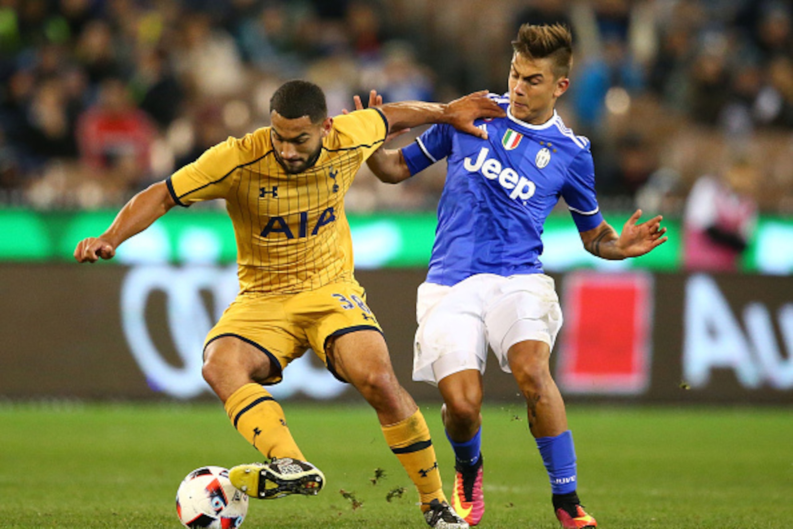 MELBOURNE, AUSTRALIA - JULY 26:  Cameron Carter-Vickers of Tottenham Hotspur and Paulo Dybala of Juventus FC compete for the ball during the 2016 International Champions Cup match between Juventus FC and Tottenham Hotspur at Melbourne Cricket Ground on Ju