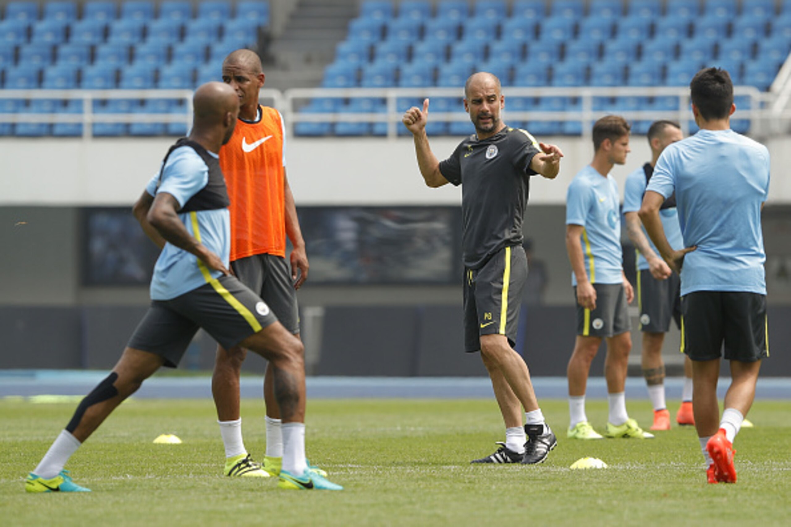 BEIJING, CHINA - JULY 24:  Manchester City's manager Pep Guardiola gestures during the pre-game training ahead of the 2016 International Champions Cup match between Manchester City and Manchester United at Olympic Sports Center Stadium on July 24, 2016 in