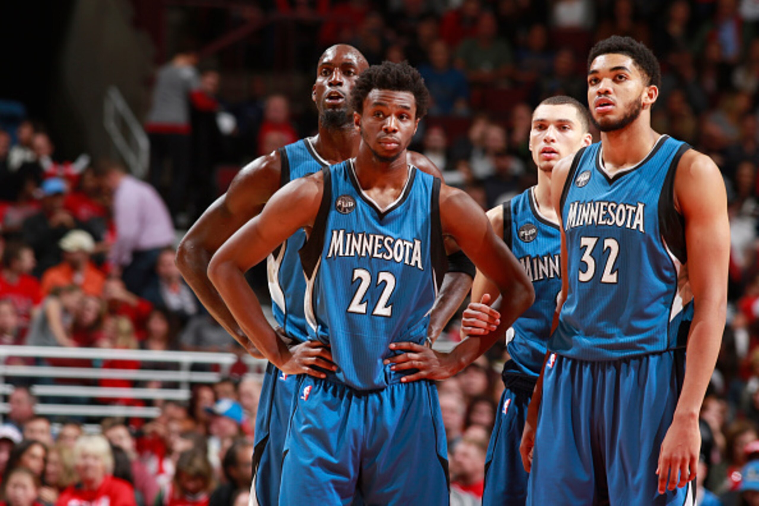 CHICAGO, IL - NOVEMBER 7:  Andrew Wiggins #22 of the Minnesota Timberwolves, Kevin Garnett #21 of the Minnesota Timberwolves, Karl-Anthony Towns #32 of the Minnesota Timberwolves and Zach LaVine #8 of the Minnesota Timberwolves stand on the court during t