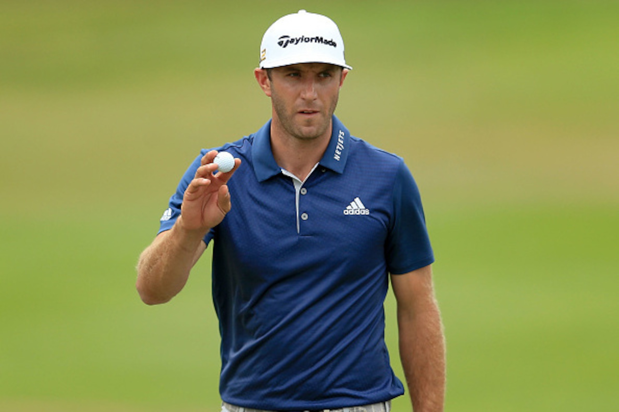 OAKVILLE, ON - JULY 24:  Dustin Johnson of the United States reacts to his putt on the second hole during the final round of the RBC Canadian Open at Glen Abbey Golf Club on July 24, 2016 in Oakville, Canada.  (Photo by Vaughn Ridley/Getty Images)