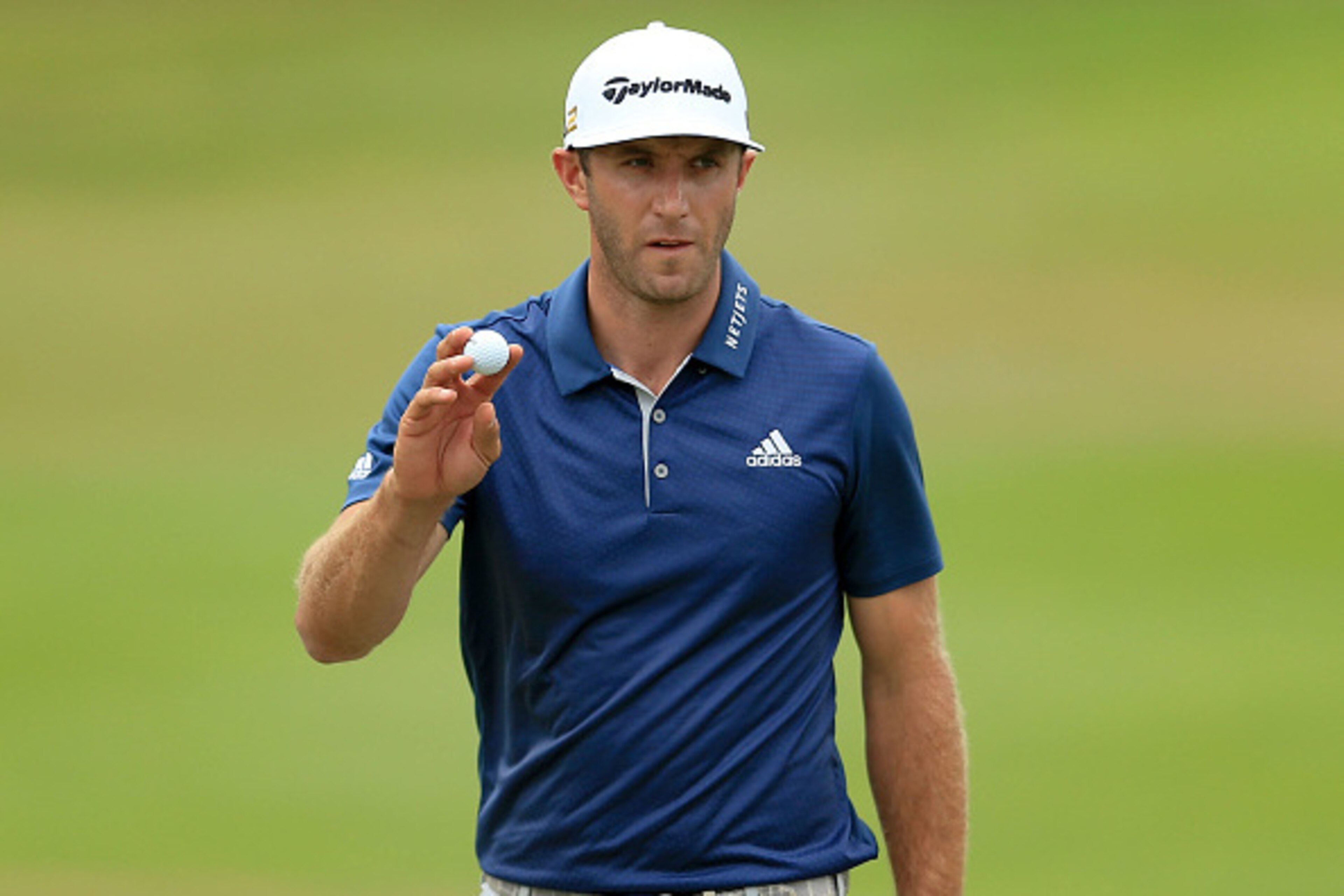 OAKVILLE, ON - JULY 24:  Dustin Johnson of the United States reacts to his putt on the second hole during the final round of the RBC Canadian Open at Glen Abbey Golf Club on July 24, 2016 in Oakville, Canada.  (Photo by Vaughn Ridley/Getty Images)