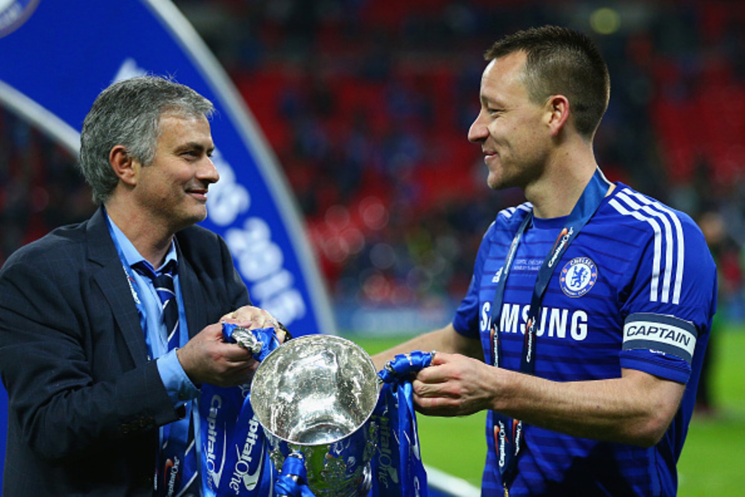 LONDON, ENGLAND - MARCH 01: Manager Jose Mourinho of Chelsea and John Terry of Chelsea celebrate with the trophy during the Capital One Cup Final match between Chelsea and Tottenham Hotspur at Wembley Stadium on March 1, 2015 in London, England. (Photo LONDON, ENGLAND - MARCH 01: Manager Jose Mourinho of Chelsea and John Terry of Chelsea celebrate with the trophy during the Capital One Cup Final match between Chelsea and Tottenham Hotspur at Wembley Stadium on March 1, 2015 in London, England. (Photo