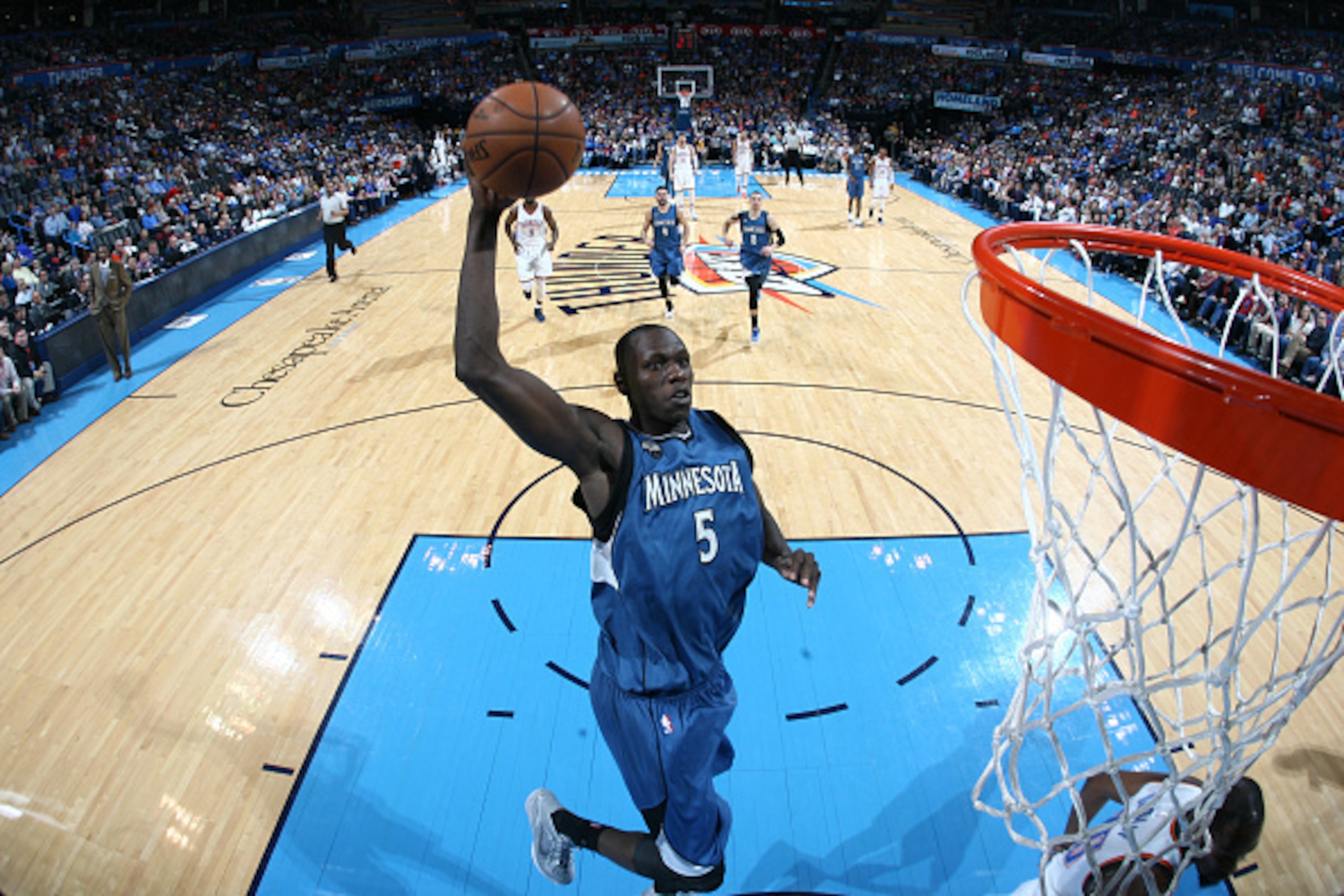 OKLAHOMA CITY, OK- MARCH 11:  Gorgui Dieng #5 of the Minnesota Timberwolves goes up for a dunk against the Oklahoma City Thunder on March 11, 2016 at Chesapeake Energy Arena in Oklahoma City, Oklahoma. NOTE TO USER: User expressly acknowledges and agrees 