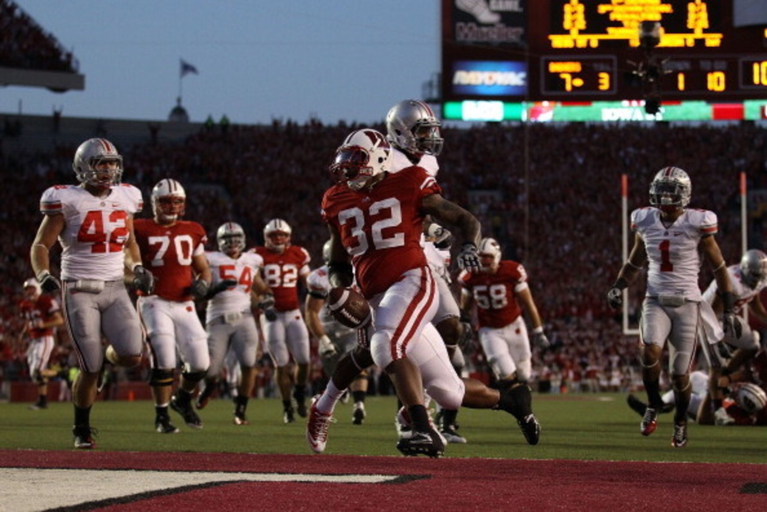 MADISON, WI - OCTOBER 16: John Clay #32 of the Wisconsin Badgers scores a touchdown against the Ohio State Buckeyes at Camp Randall Stadium on October 16, 2010 in Madison, Wisconsin. Wisconsin defeated Ohio State 31-18. (Photo by Jonathan Daniel/Getty Ima
