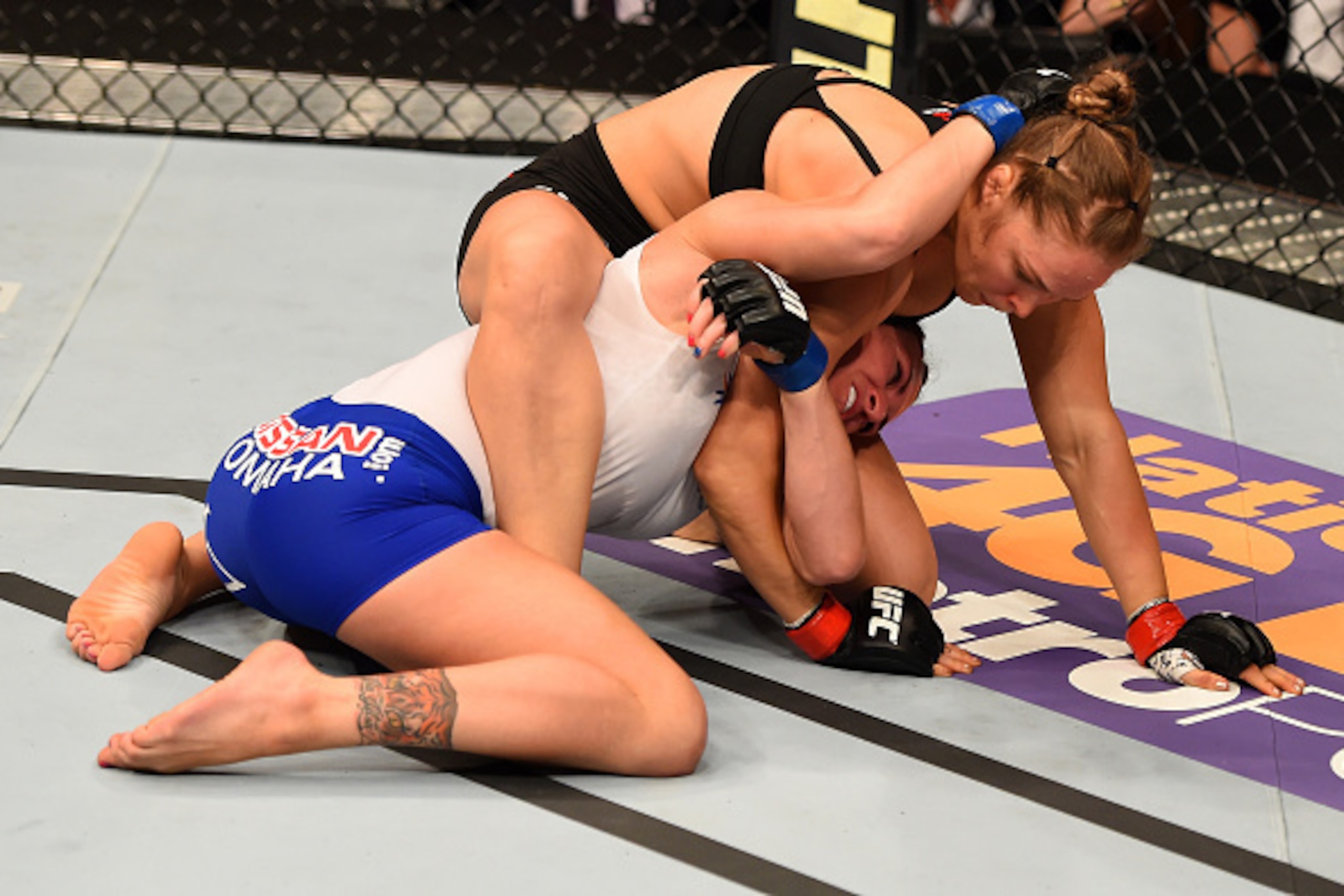 LOS ANGELES, CA - FEBRUARY 28:  (Top) Ronda Rousey grapples with Cat Zingano in their UFC women's bantamweight championship bout during the UFC 184 event at Staples Center on February 28, 2015 in Los Angeles, California.  (Photo by Josh Hedges/Zuffa LLC/Z