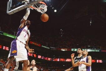 PHOENIX - APRIL 25:  Amare Stoudemire #1 of the Phoenix Suns dunks in Game Three of the Western Conference Quarterfinals against the San Antonio Spurs during the 2008 NBA Playoffs at U.S. Airways Center on April 25, 2008, in Phoenix, Arizona. The Spurs wo
