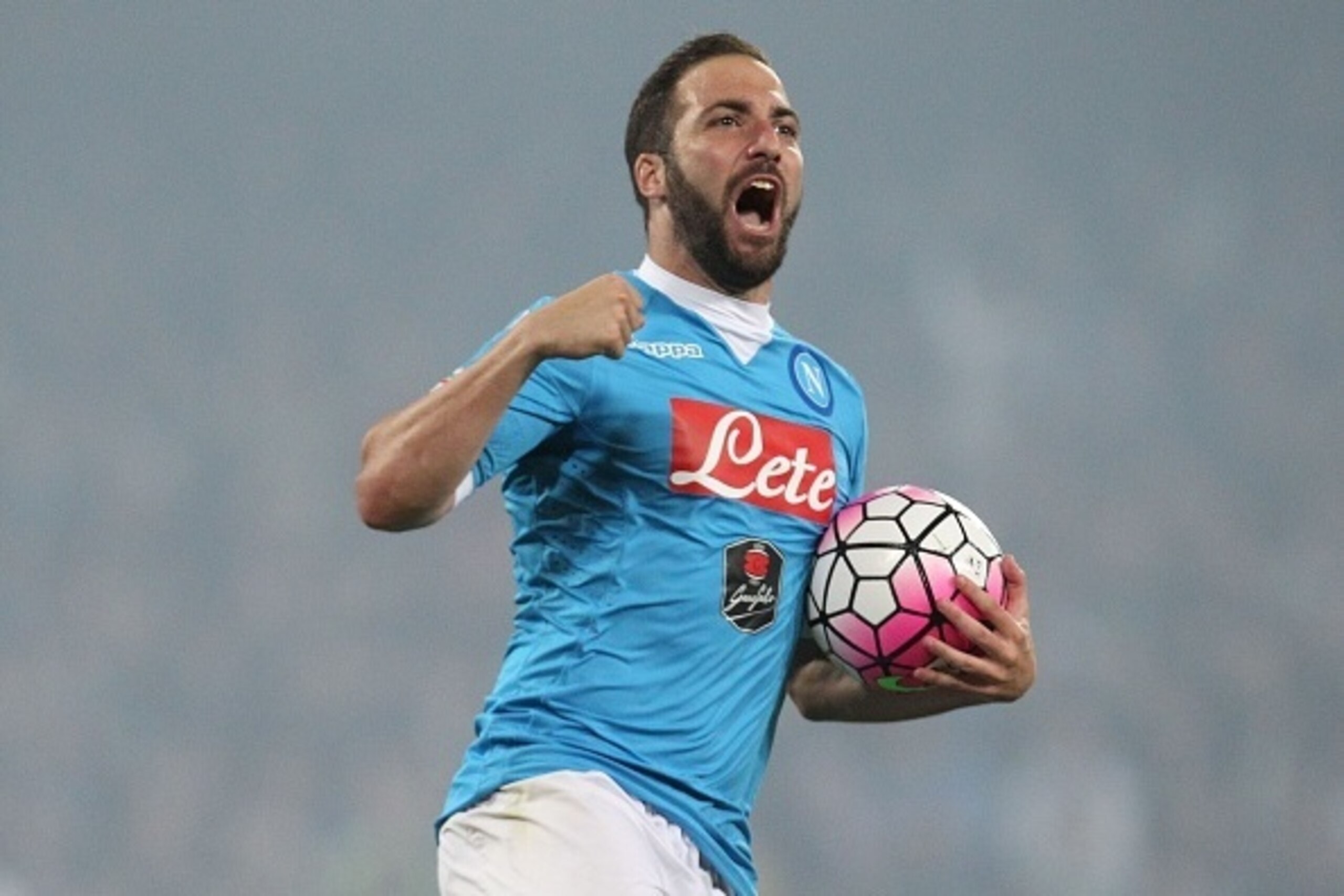TOPSHOT - Napoli's Argentinian-French forward Gonzalo Higuain celebrates after scoring his third goal during the Italian Serie A football match SSC Napoli vs Frosinone Calcio on May 14 2016 at the San Paolo stadium in Naples.
Napoli won the match 4-0. / A